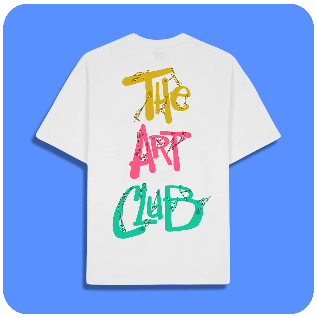 White T-shirt with colorful letters spelling "THE ART CLUB" in yellow, pink, and teal, decorated with small illustrations of art supplies like paintbrushes, pencils, and markers.
