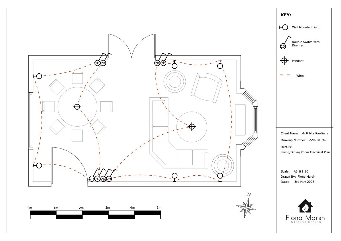 Electrical plan for living/dining room, showing light fixtures, switches, and wiring layout. Legend indicates wall-mounted lights, double switches with dimmer, and pendants. An arrangement of furniture including a dining table and living room seating is also depicted.