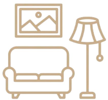 A cozy home interior with a sofa, a floor lamp, and a picture frame on the wall.