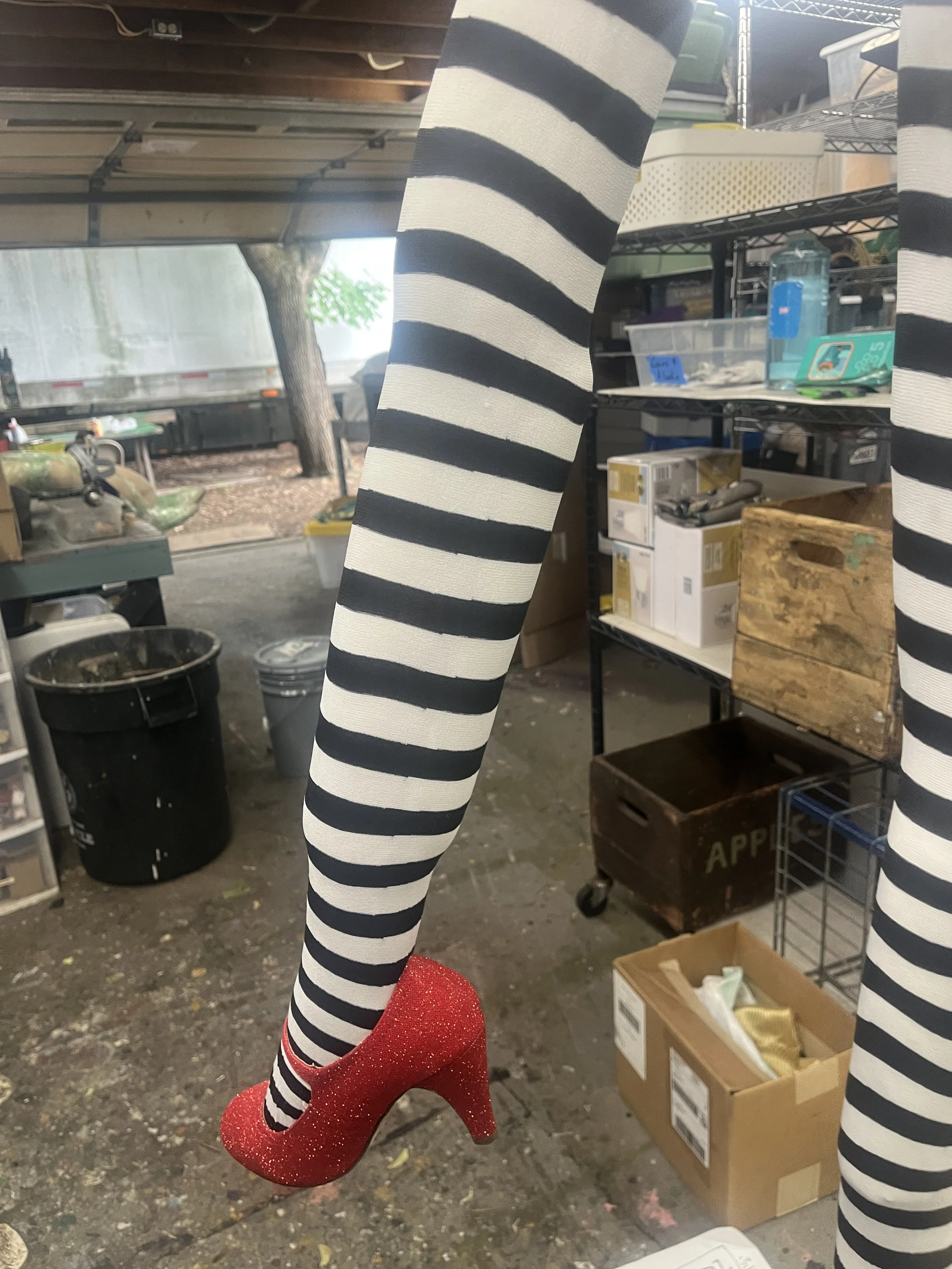 Dummy Witch Legs, Wearing Black and white Striped Stockings and Red Heeled Shoes