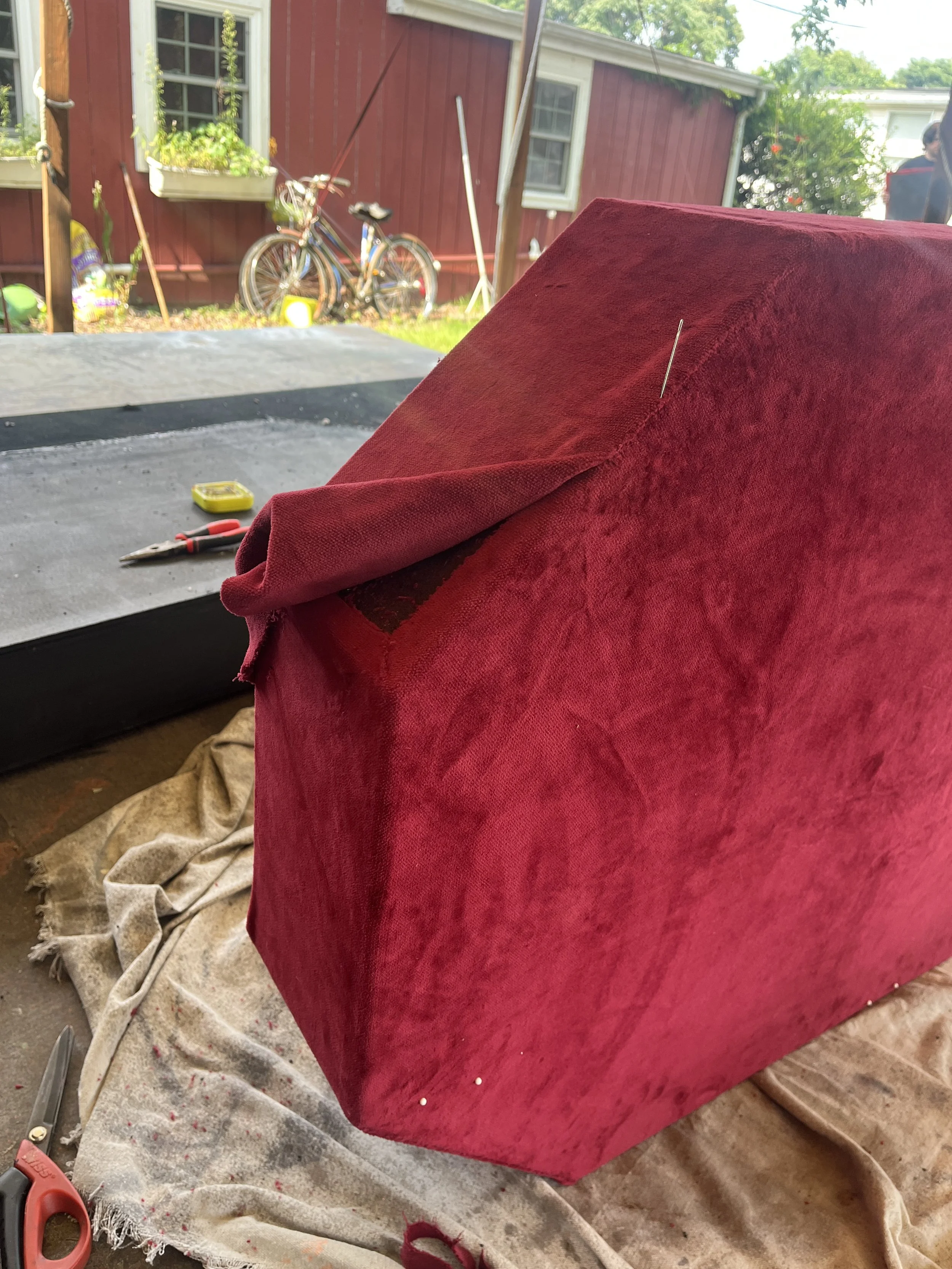 Finishing Edge of Upper Carriage Platform for Cinderella Jr, Upholstered in Red Velour