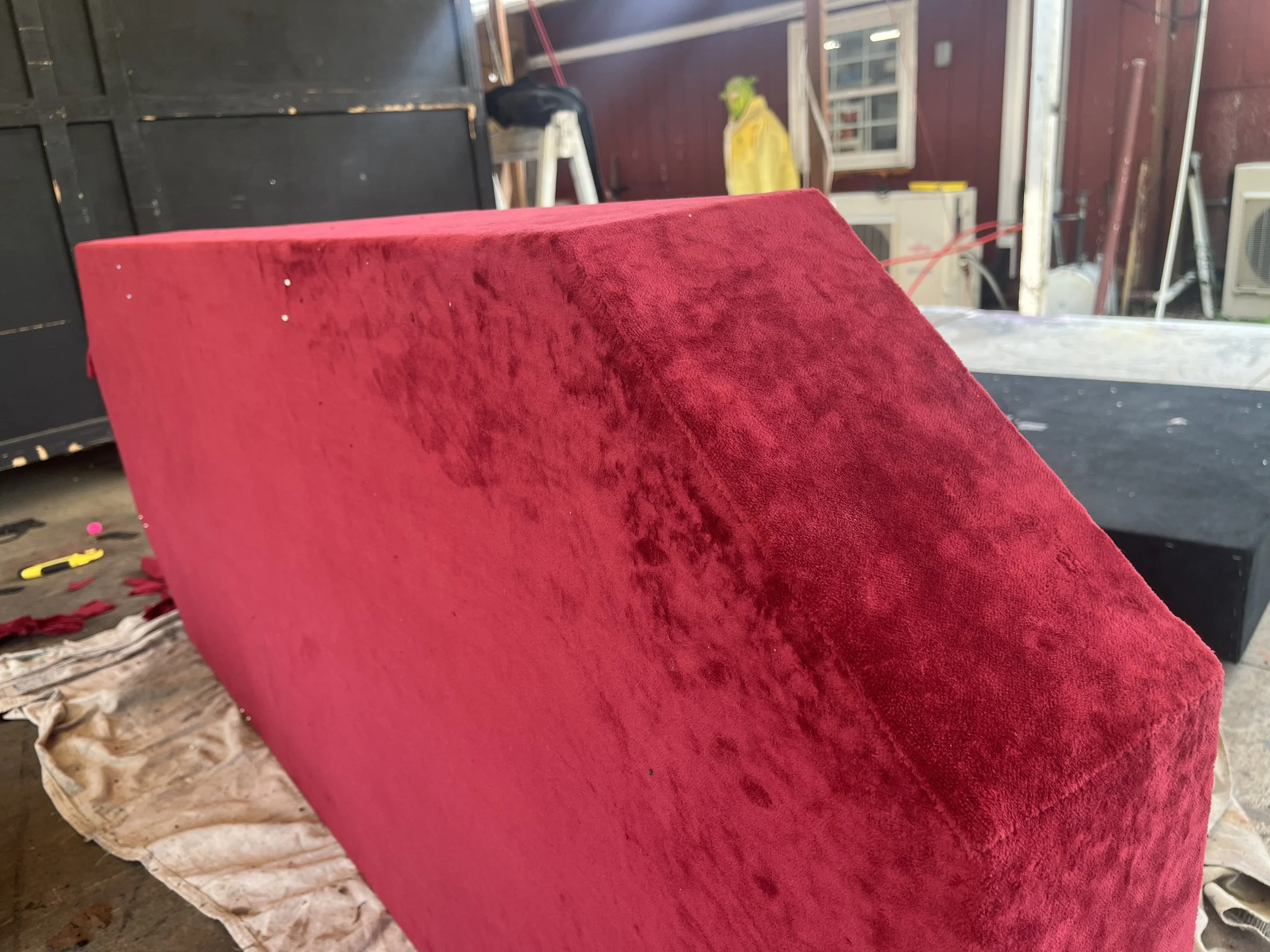 Hand-sewn Edge of Upper Carriage Platform for Cinderella Jr, Upholstered in Red Velour