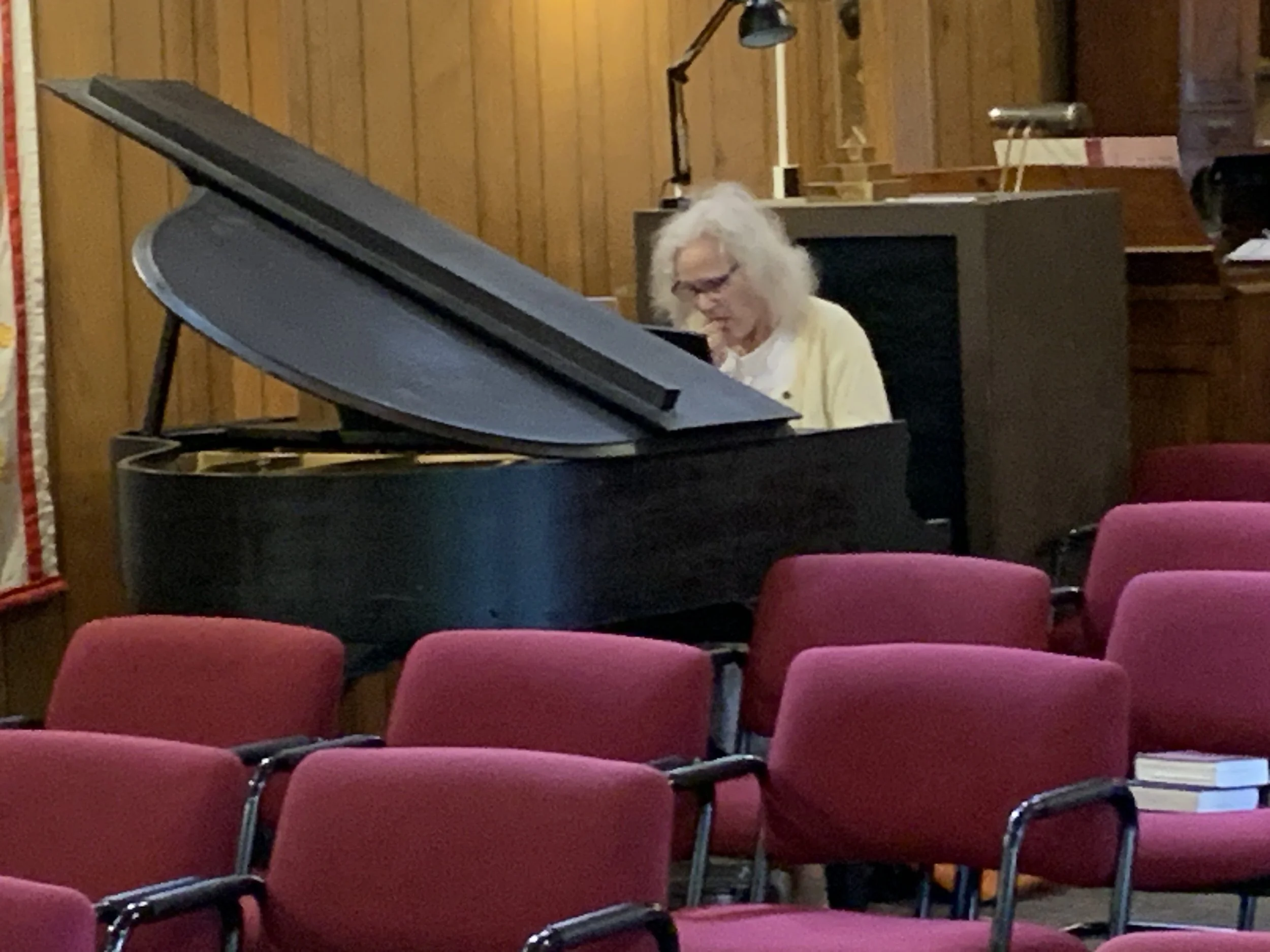 Gretchen checking out the new piano.