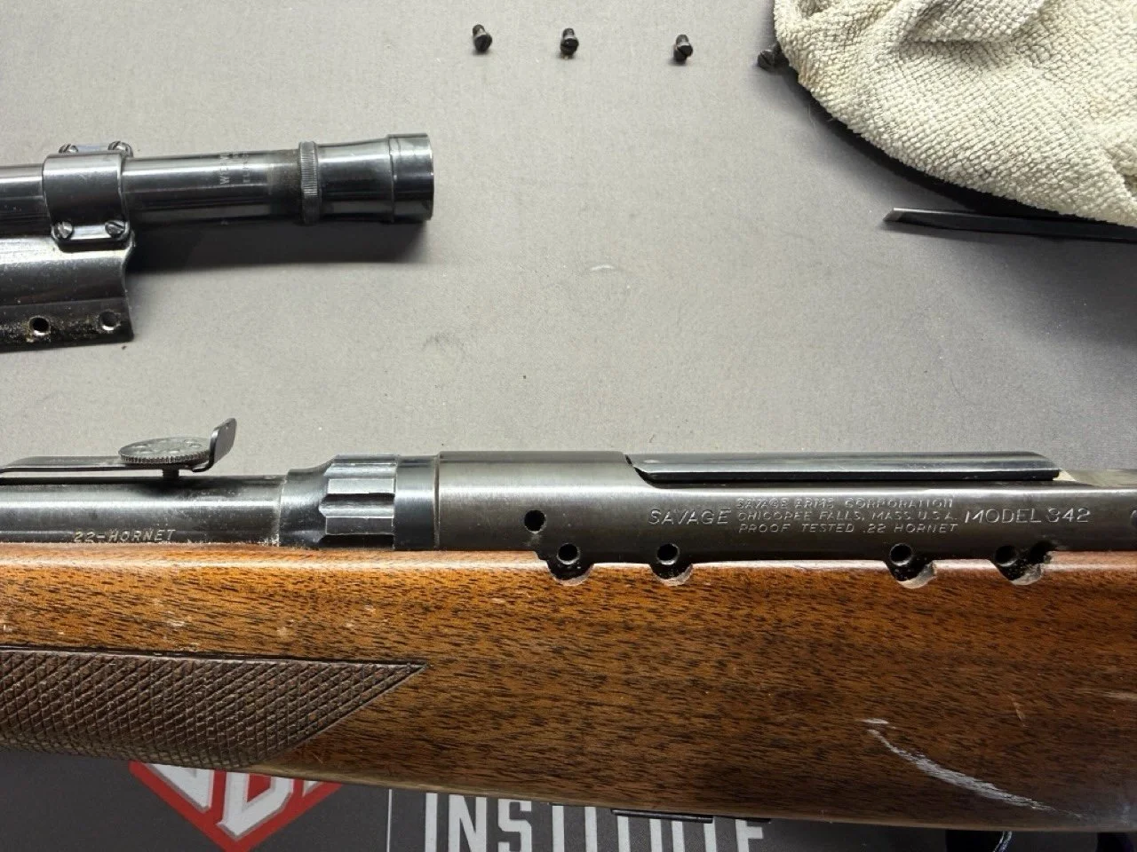 Used Savage Arms .22 Hornet comes with side mounted Weaver optic and one mag