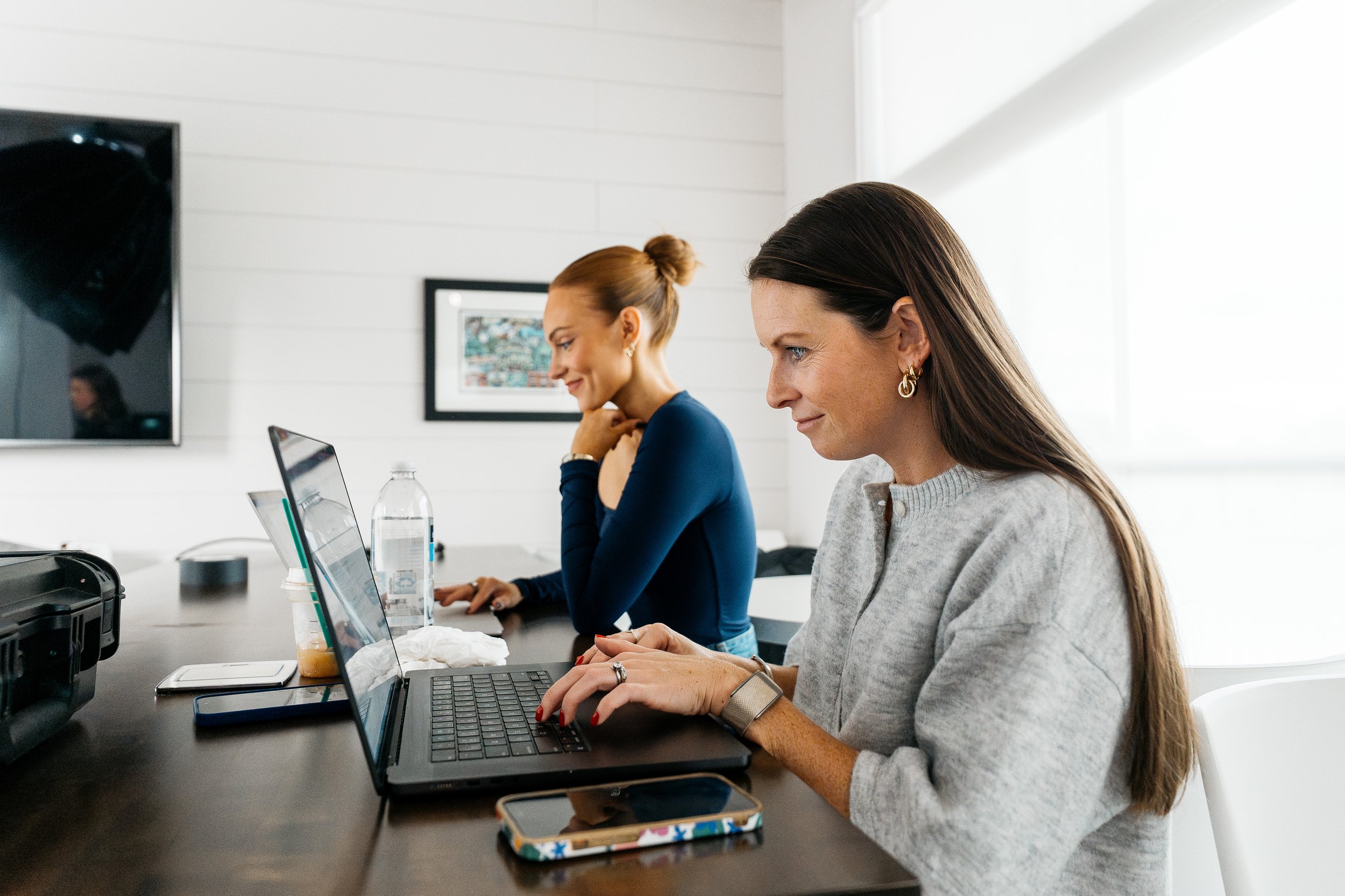 working with team on the laptop. 2026 marketing