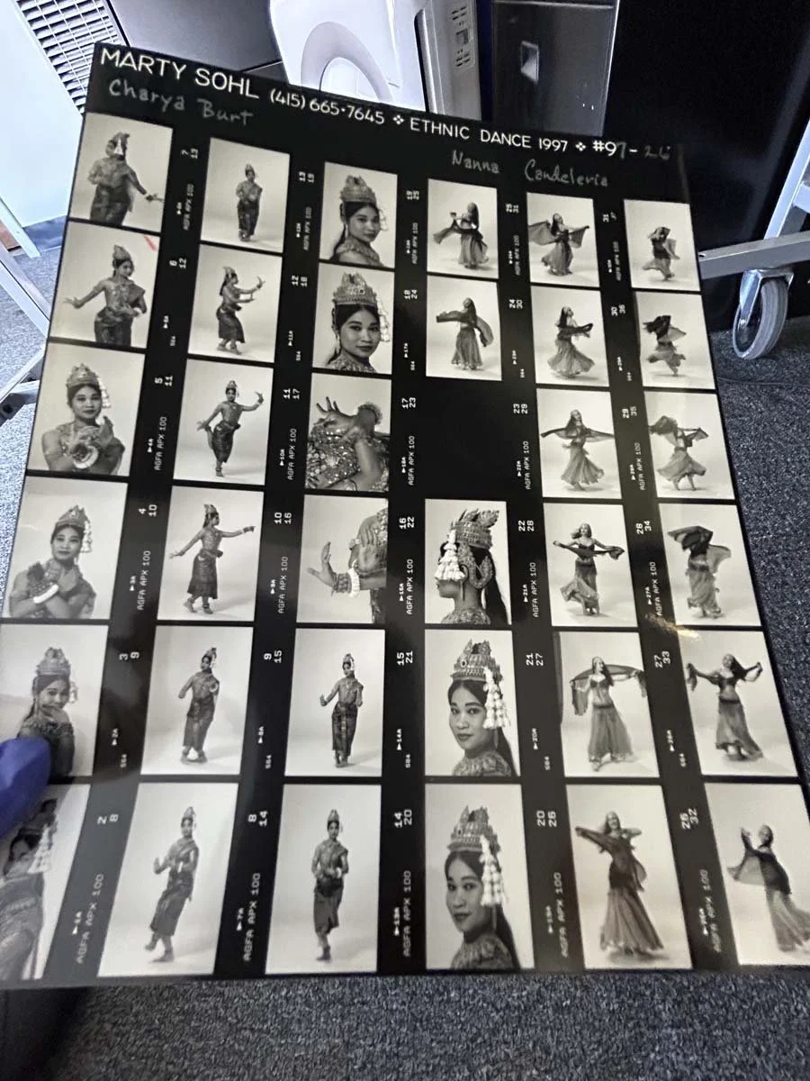 Black-and-white contact sheet of ethnic dance performers in traditional costumes, labeled Marty Sohl and featuring Charya Burt and Nanna Candelaria.