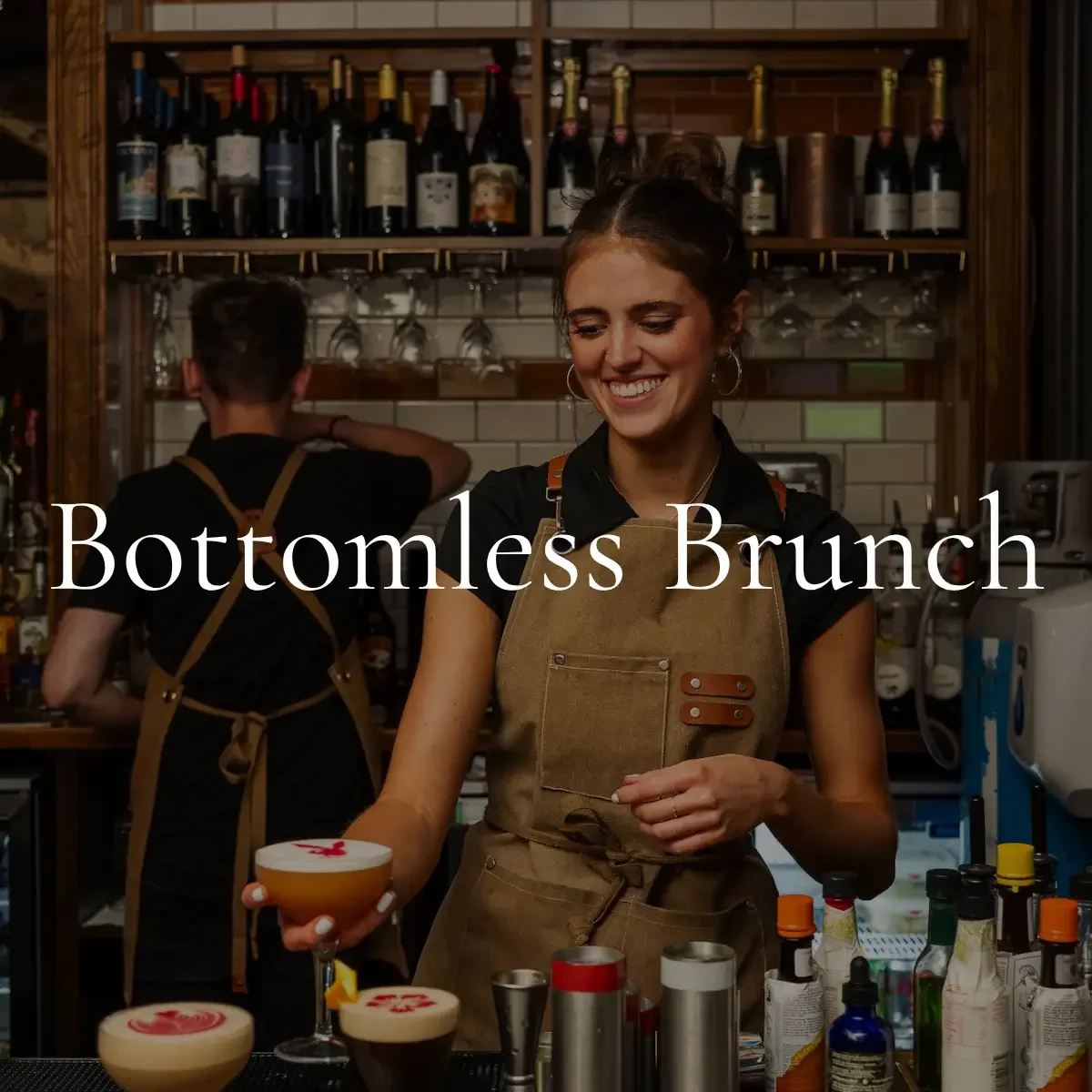 A smiling woman behind a bar holding a cocktail, with shelves of wine bottles and bar tools in the background, and the text "Bottomless Brunch" overlaid.