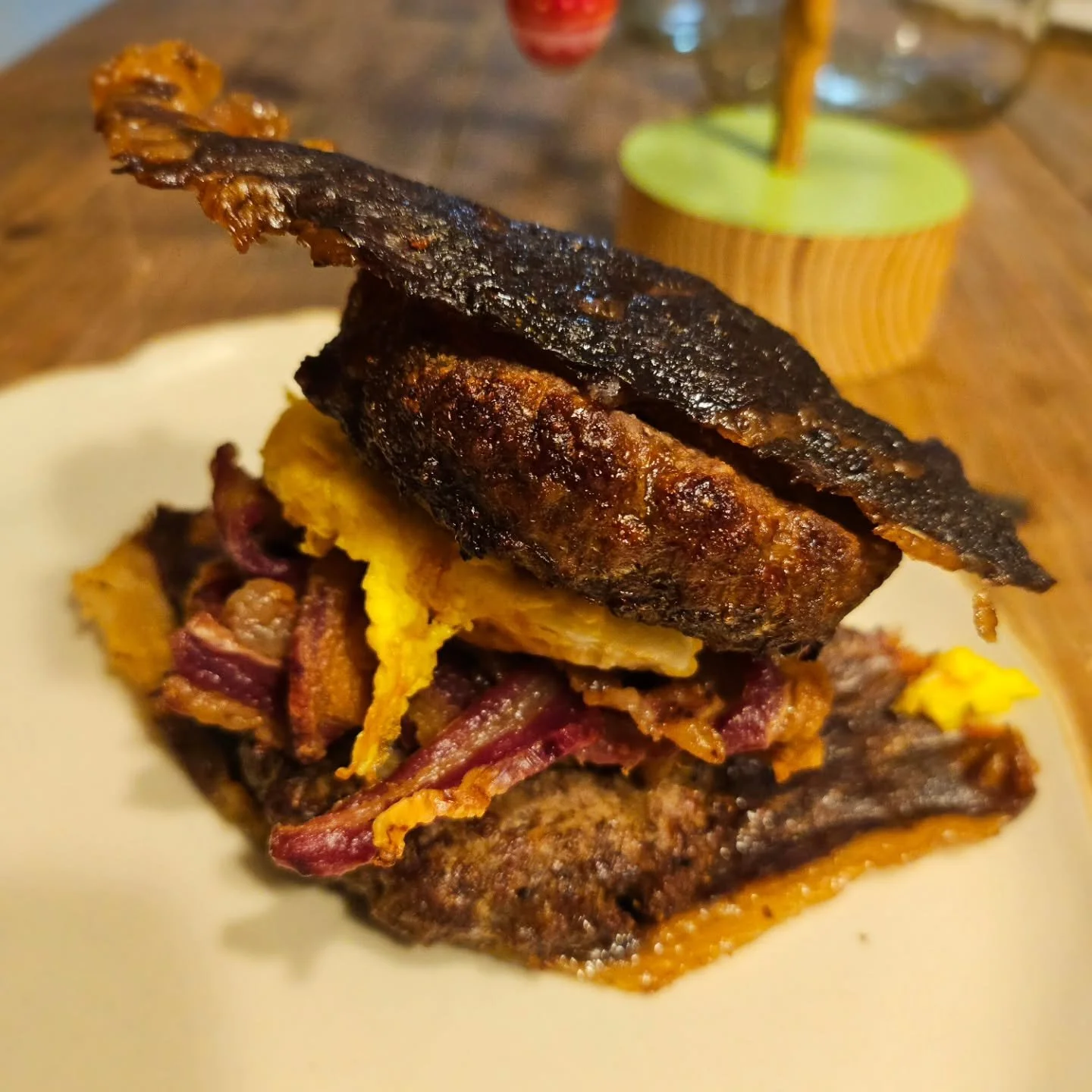 This burger is just like all my favorite people - totally weird, but that's why it's amazing!

Two ground chuck patties, a fried egg, &amp; lamb bacon between "buns" of Wagyu Bottom Round @carnivore.snax - all cooked in duck fat!

Juicy, cr