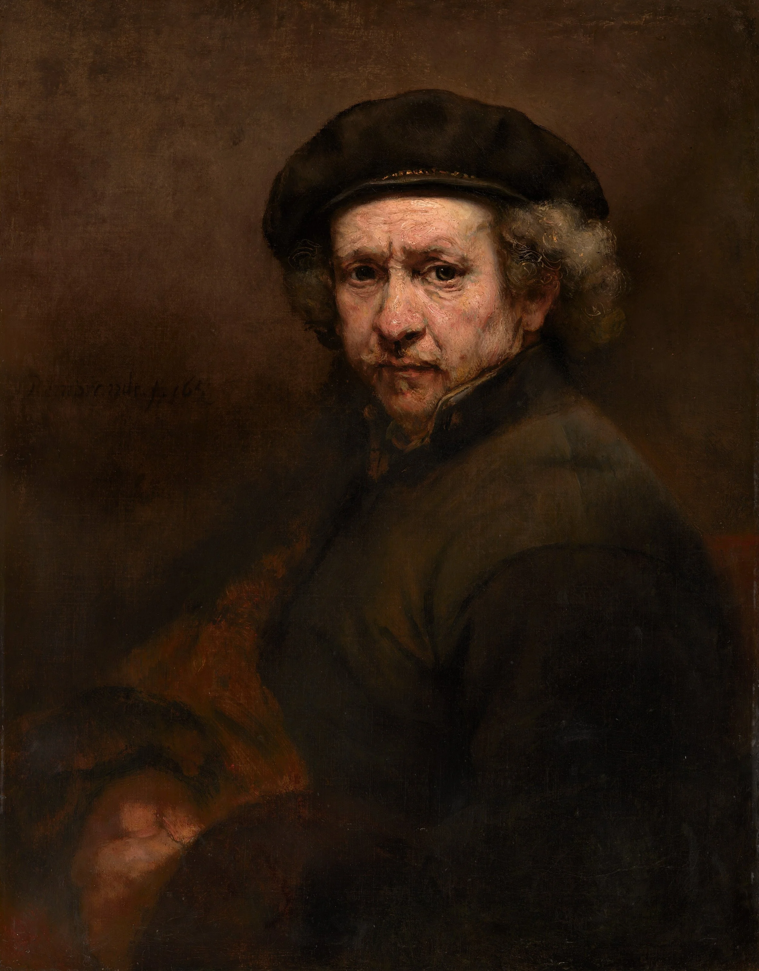 A portrait of a person wearing a black hat and dark clothing, with a dark brown background.