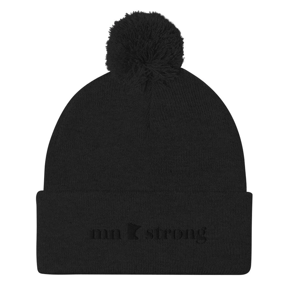 pom-pom-knit-cap-black-front-6977e3484efc9.webp