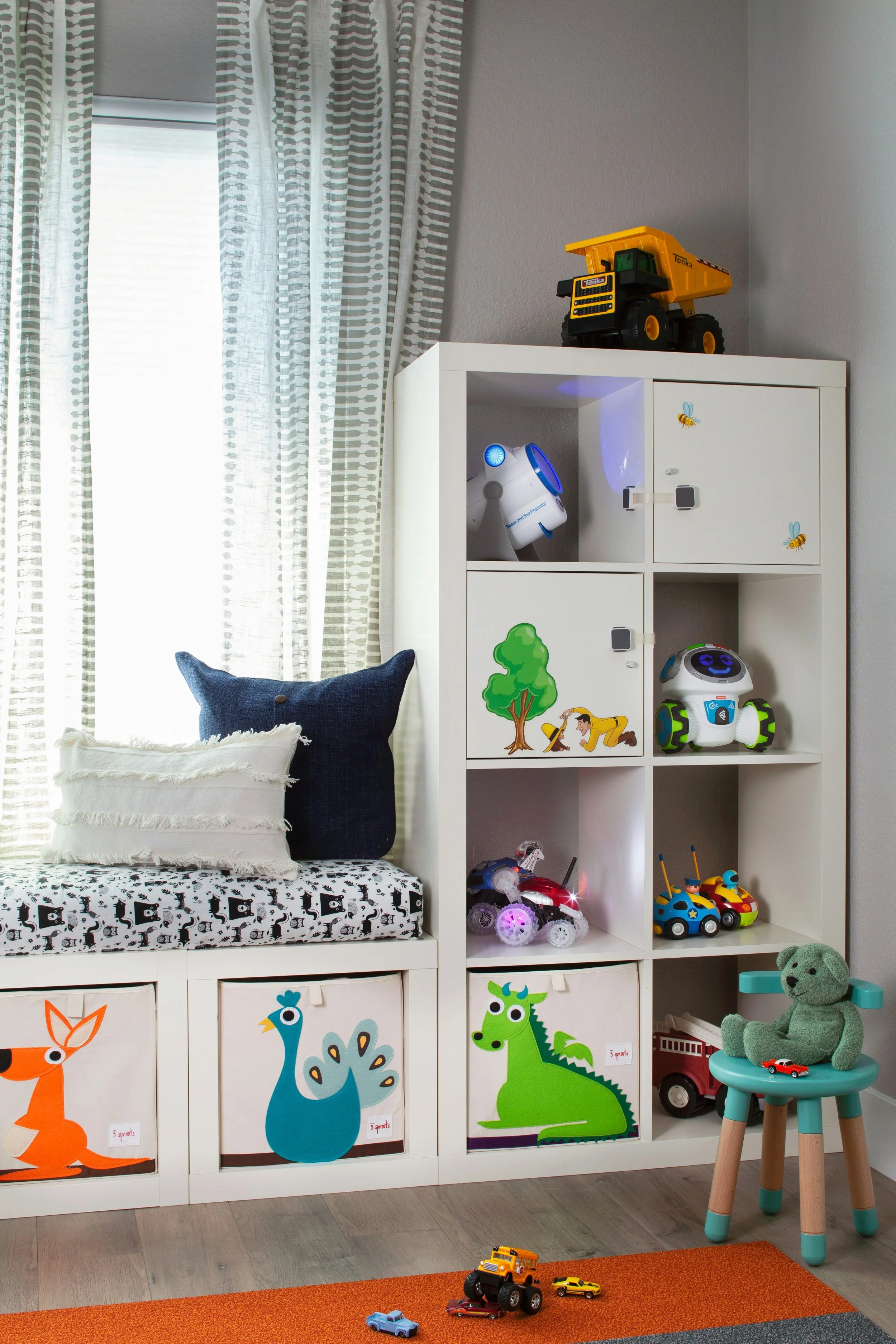 Clutter-free kids’ room featuring cubicle shelves with orderly storage cubes