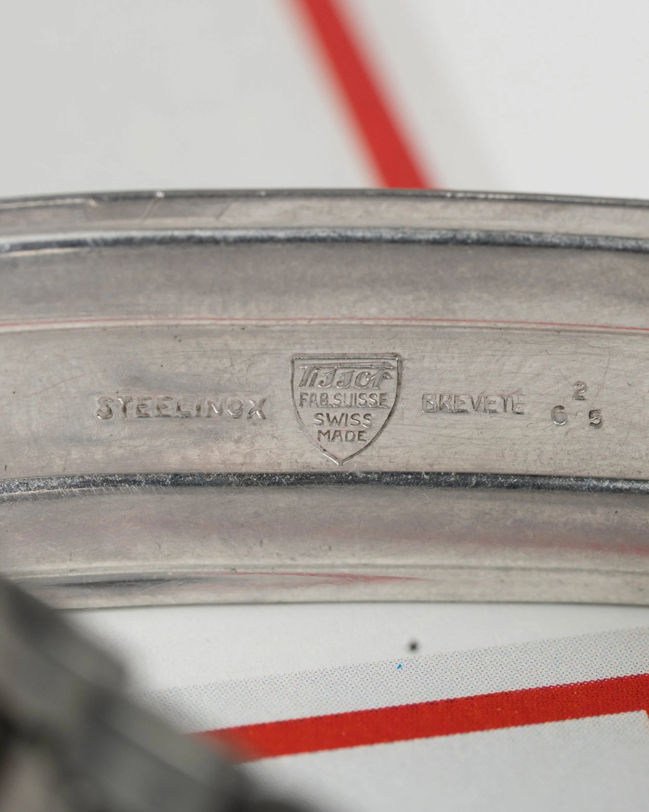 Vintage 1970s Tissot PR-516 Automatic Diver. Features a teal blue dial, orange seconds hand, and original steel Gay Freres bracelet.