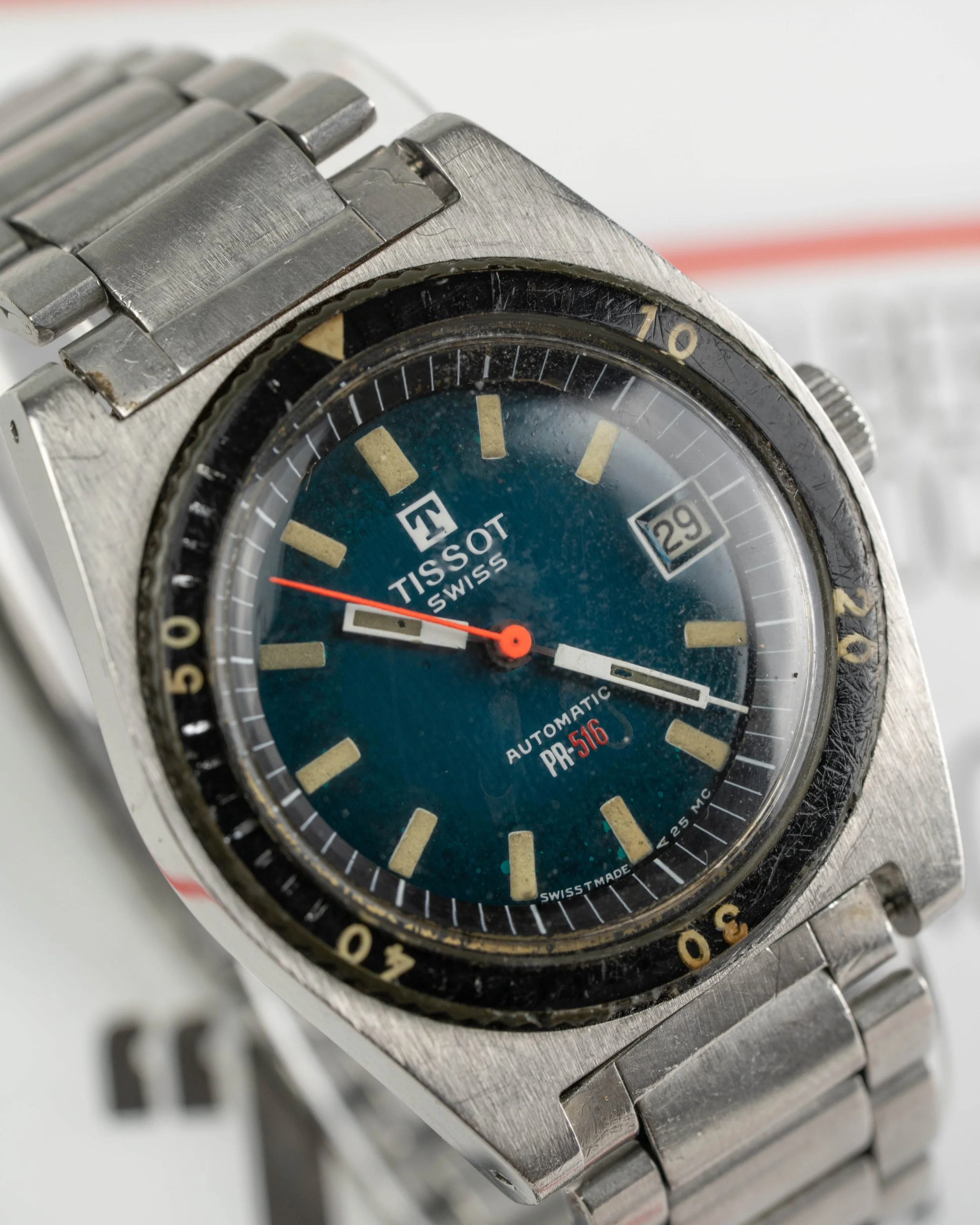 Tissot PR-516 mechanical diver watch. 36mm cushion case with Bakelite bezel and rare original Tissot Gay Freres steel bracelet.