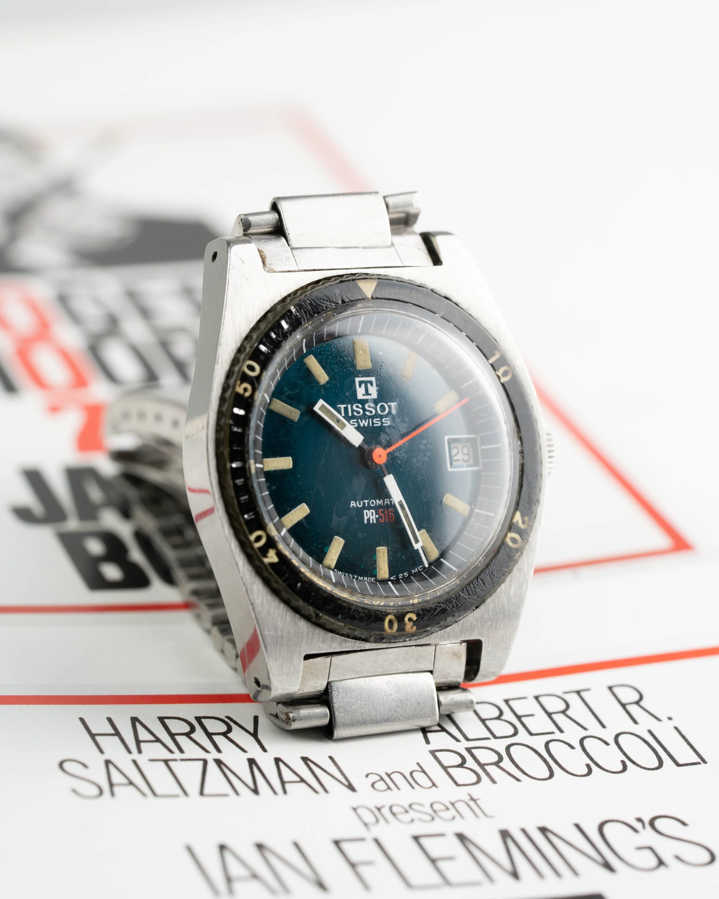 Collectible Roger Moore James Bond Tissot PR-516. The exact model worn in "Live and Let Die" with unpolished case and GF bracelet.