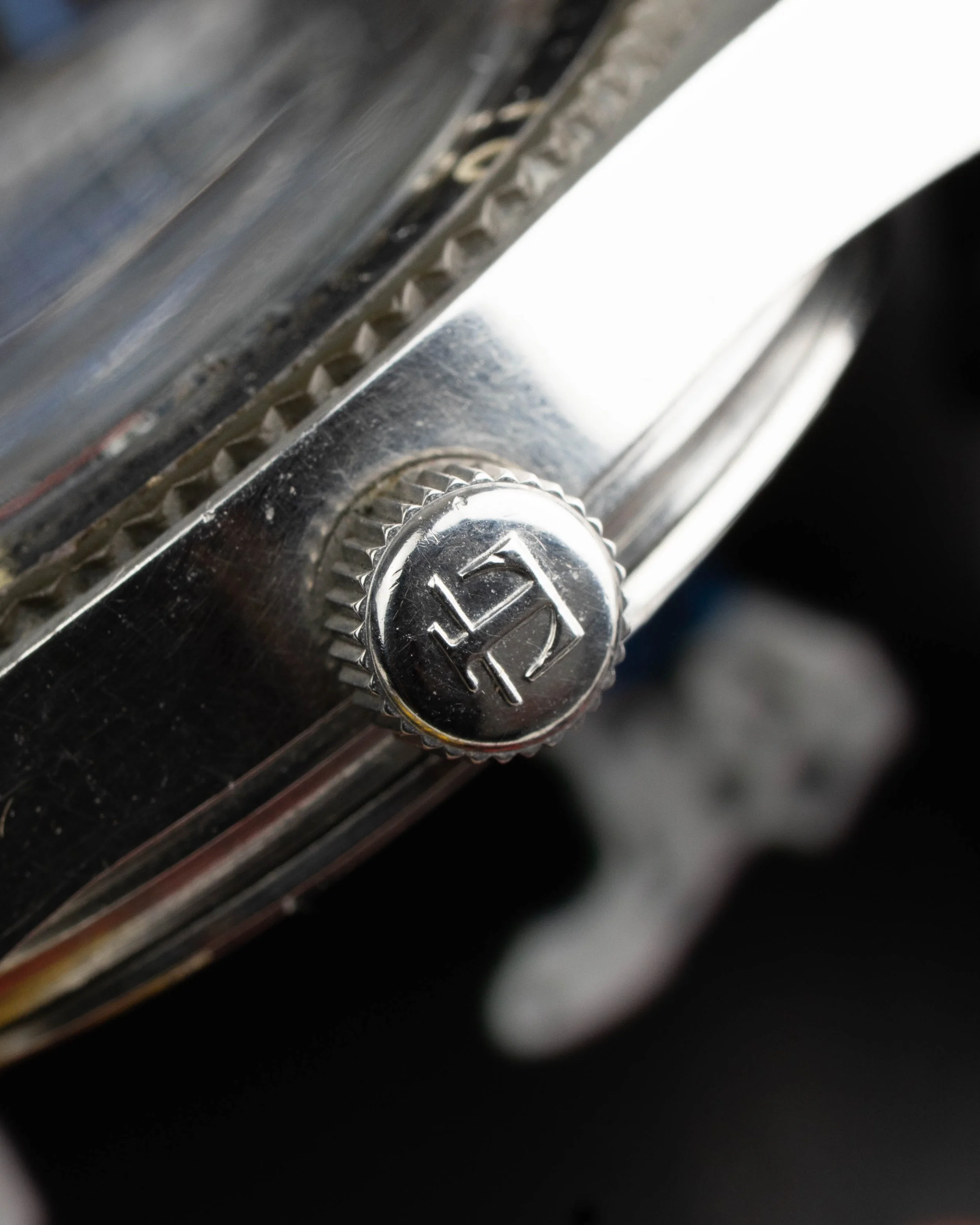 Collectible Roger Moore James Bond Tissot PR-516. The exact model worn in "Live and Let Die" with unpolished case and GF bracelet.