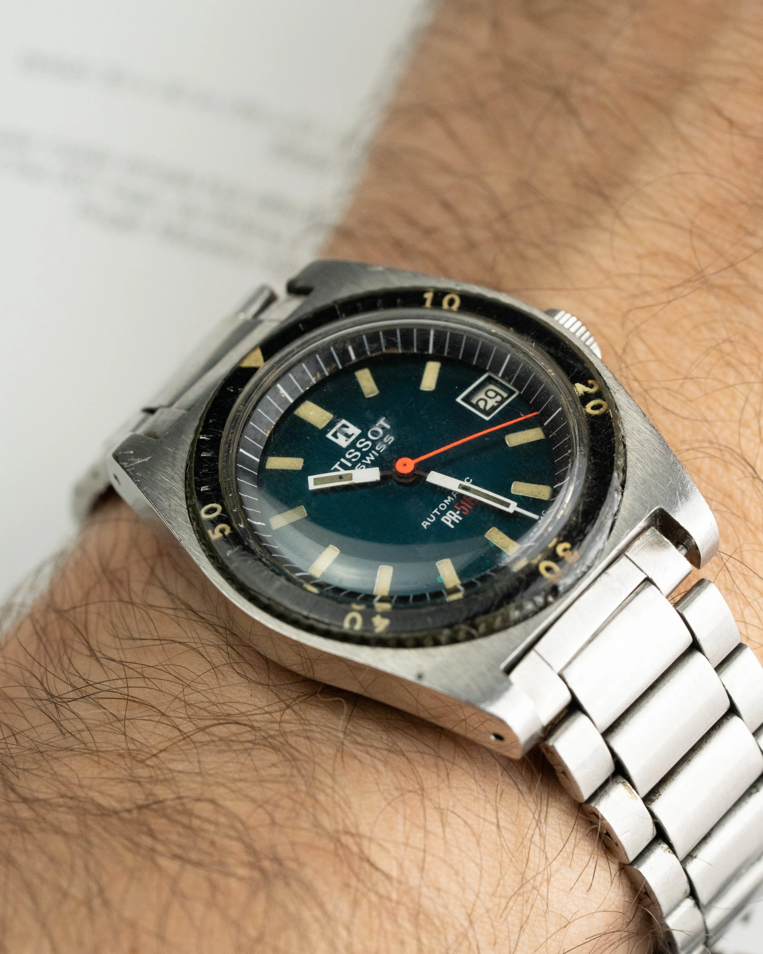 Tissot PR-516 mechanical diver watch. 36mm cushion case with Bakelite bezel and rare original Tissot Gay Freres steel bracelet.