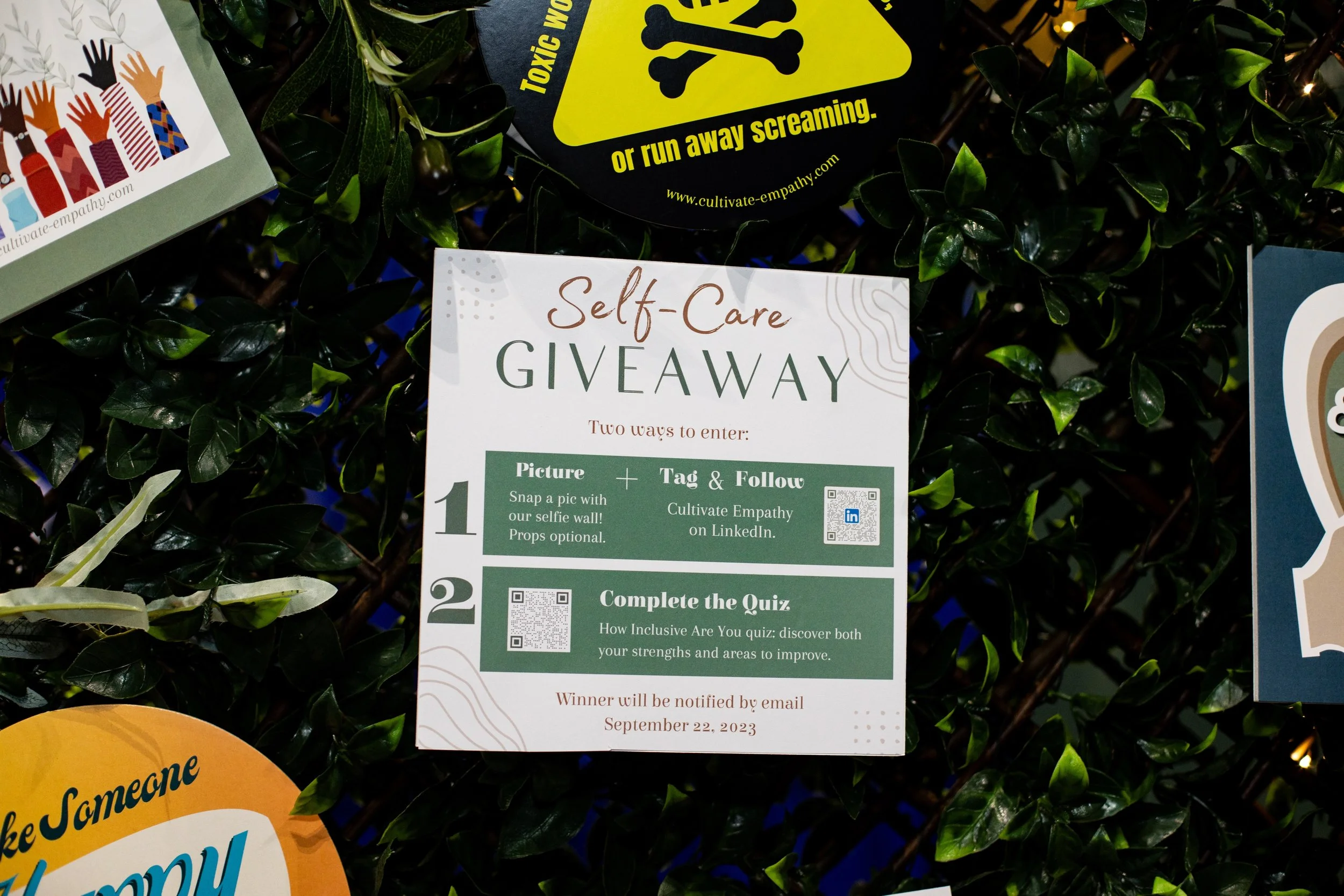 A promotional flyer for a self-care giveaway on a leafy background. It includes instructions for entering via a selfie and LinkedIn, and for completing a quiz, with a date of September 22, 2023.