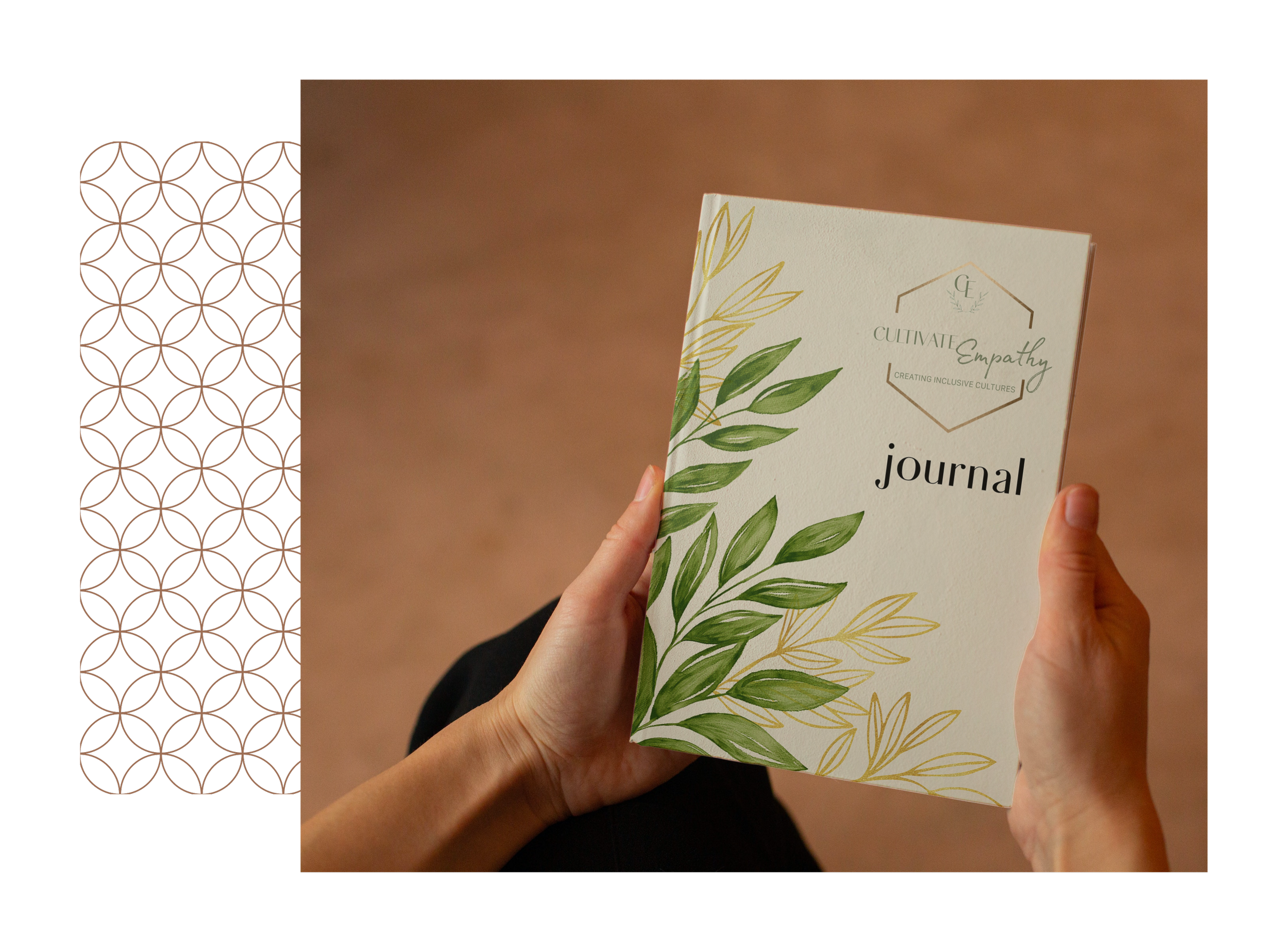Person holding a journal with a beige cover decorated with green and yellow leaves, labeled 'Cultivate Empathy Journal'.