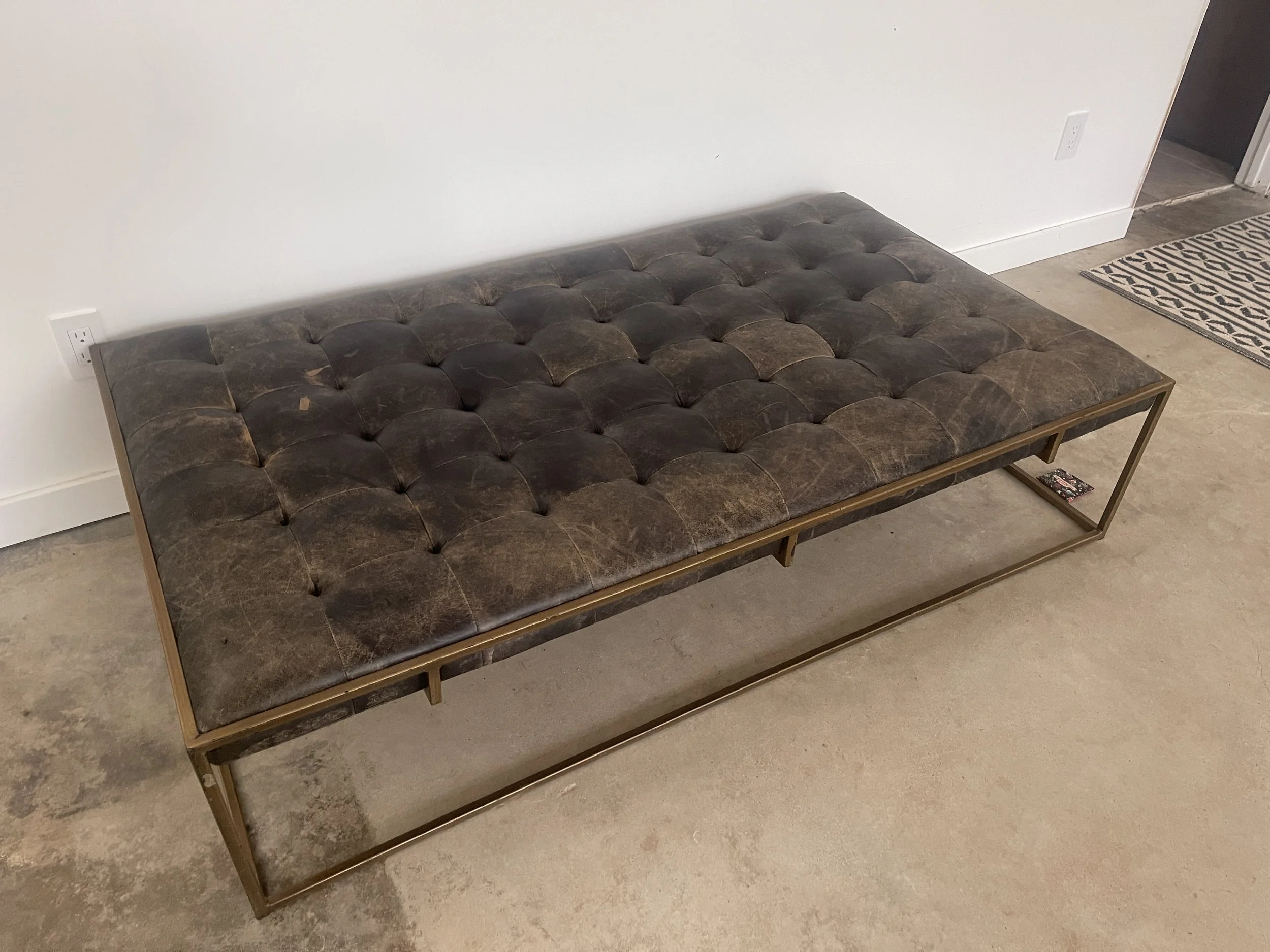 Oxford brown/black leather coffee table/ottoman - rental only