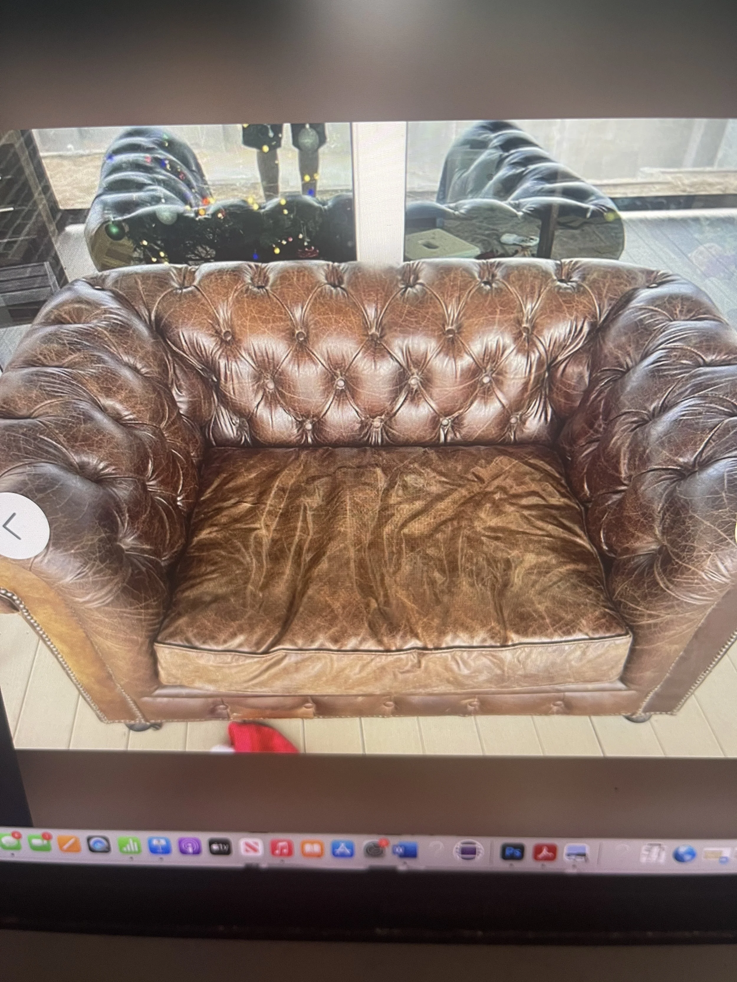 Brown oversized leather chair - rental only