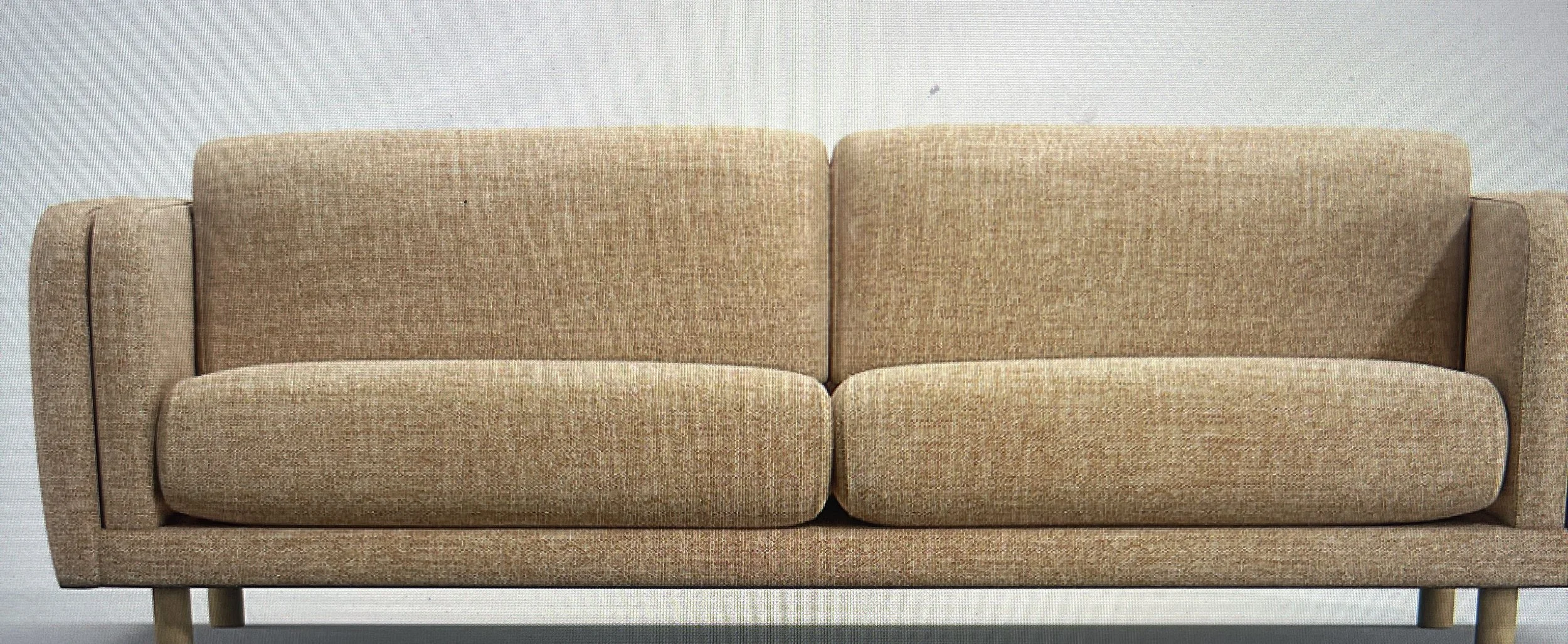 Cinnamon colored CB2 love seat - rental only