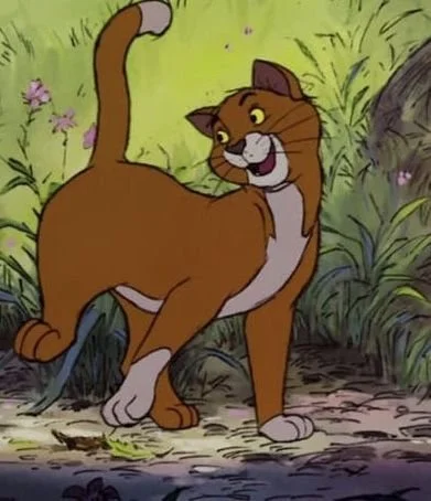 Animated scene of a happy brown and white cat walking outdoors through grass and rocks.
