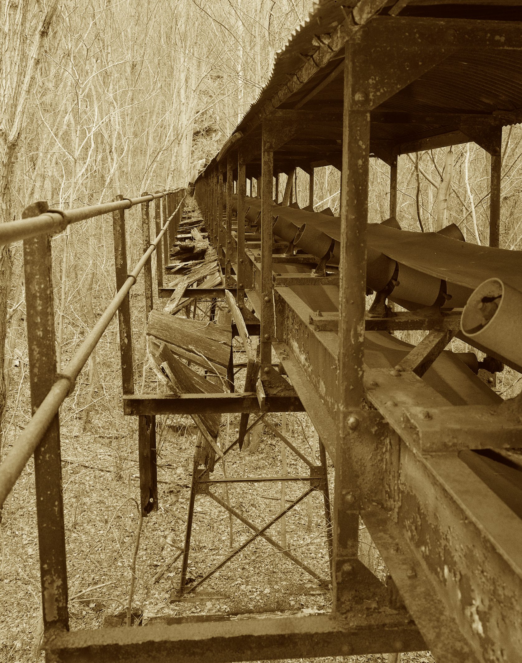 Carved in stone and hewn by sweat,
Kaymoor's coal town lingers yet.
With twin towns split by stairs and slope,
The mine gave work, the men gave hope.
Now nature wraps what time once claimed—
Its ghostly gears remain unnamed.