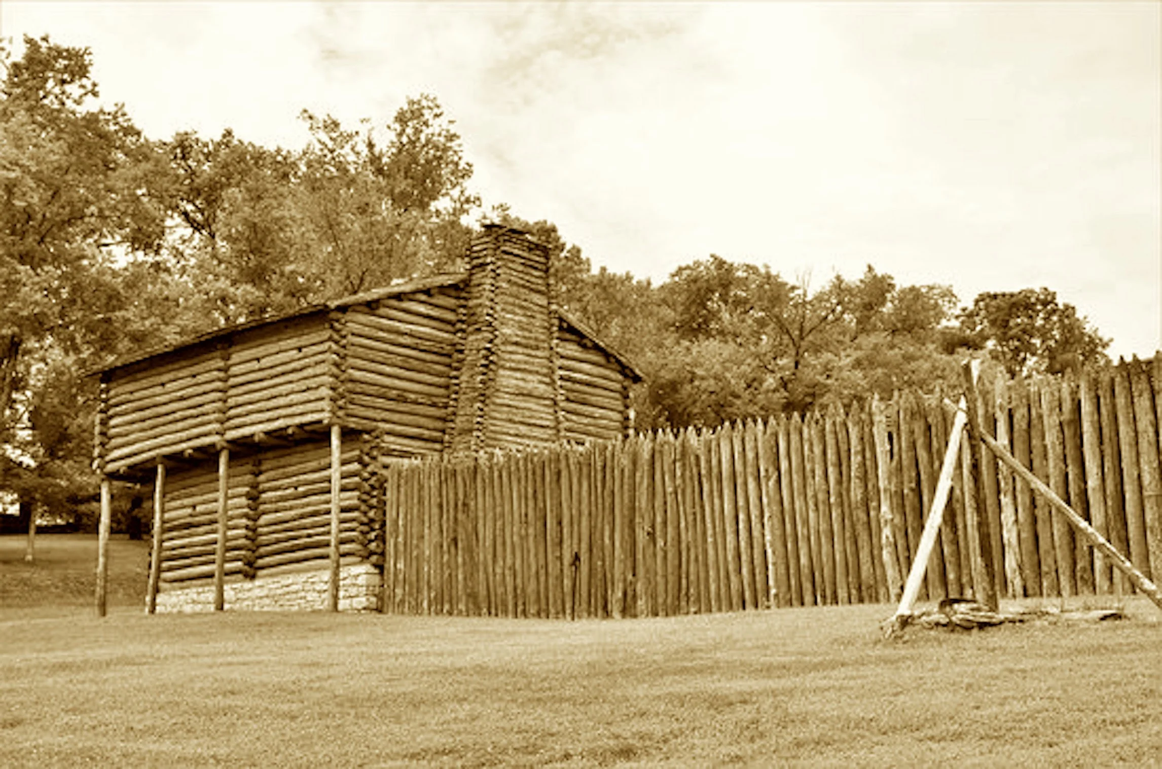 Harrod rode west where few would dare,
To carve a town from frontier air.
A cabin first, then battles fought—
Then vanished, chasing myths long sought.
Today the fort’s a tale retold,
Where parking lots now guard the bold.