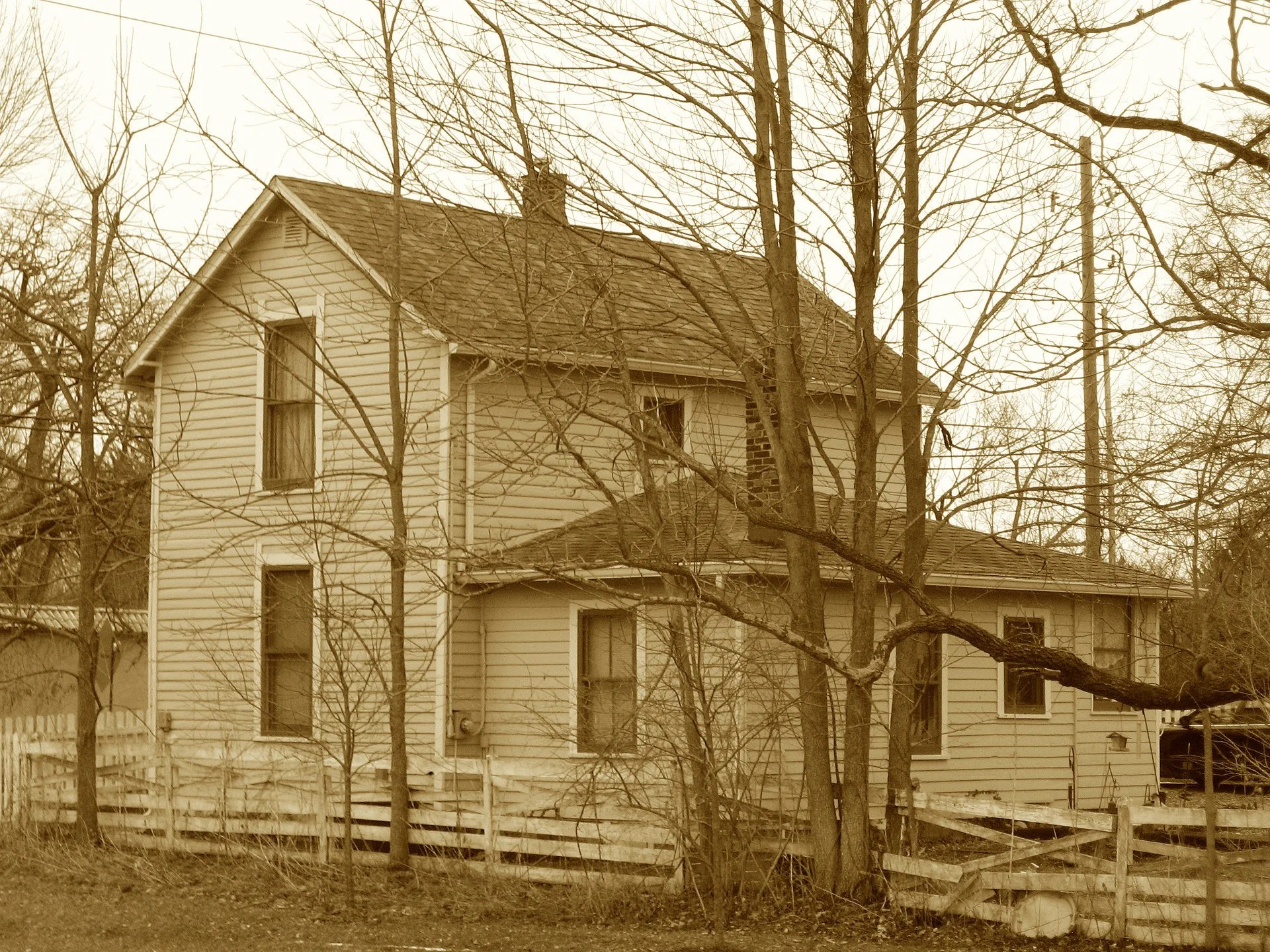 A highway was carved through the Indiana wild,
And Potawatomi marched where once they had smiled.
To smooth out the bumps, a road firm was born—
And this little toll house took fees every morn.
Today it still stands by the gravel road bend,
Where tra