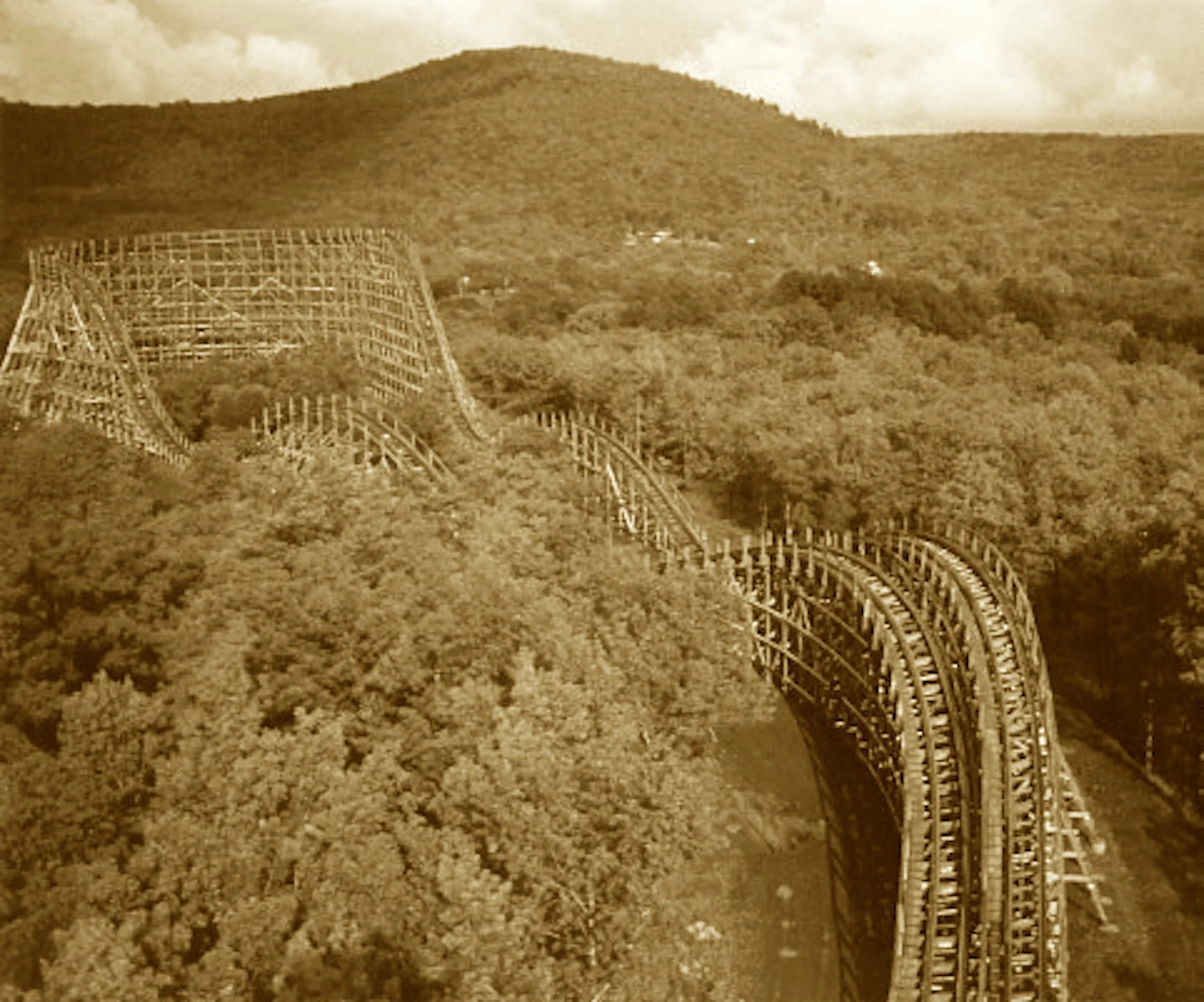 From Florida’s coast to the mountains' embrace,
This coaster found its resting place.
A tiger once tamed by Michael’s crew—
Now thrills anew with each wind-blown view.