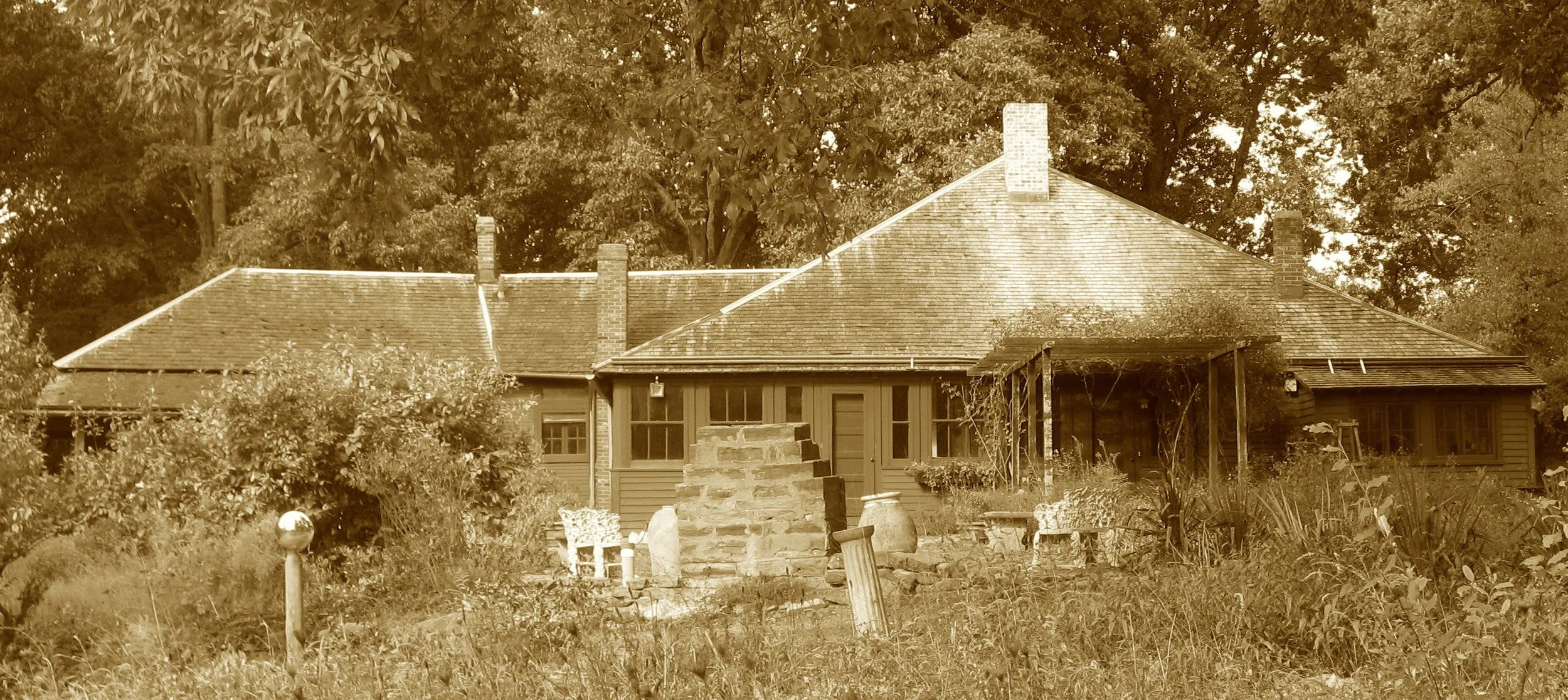 Where hills meet the mist in a Brown County glen,
The dean of Hoosier painters picked up his pen.
With palettes and brush, he captured the light
And founded a colony shaded in white.
Today you can wander his studio trail,
And glimpse the soft hues of