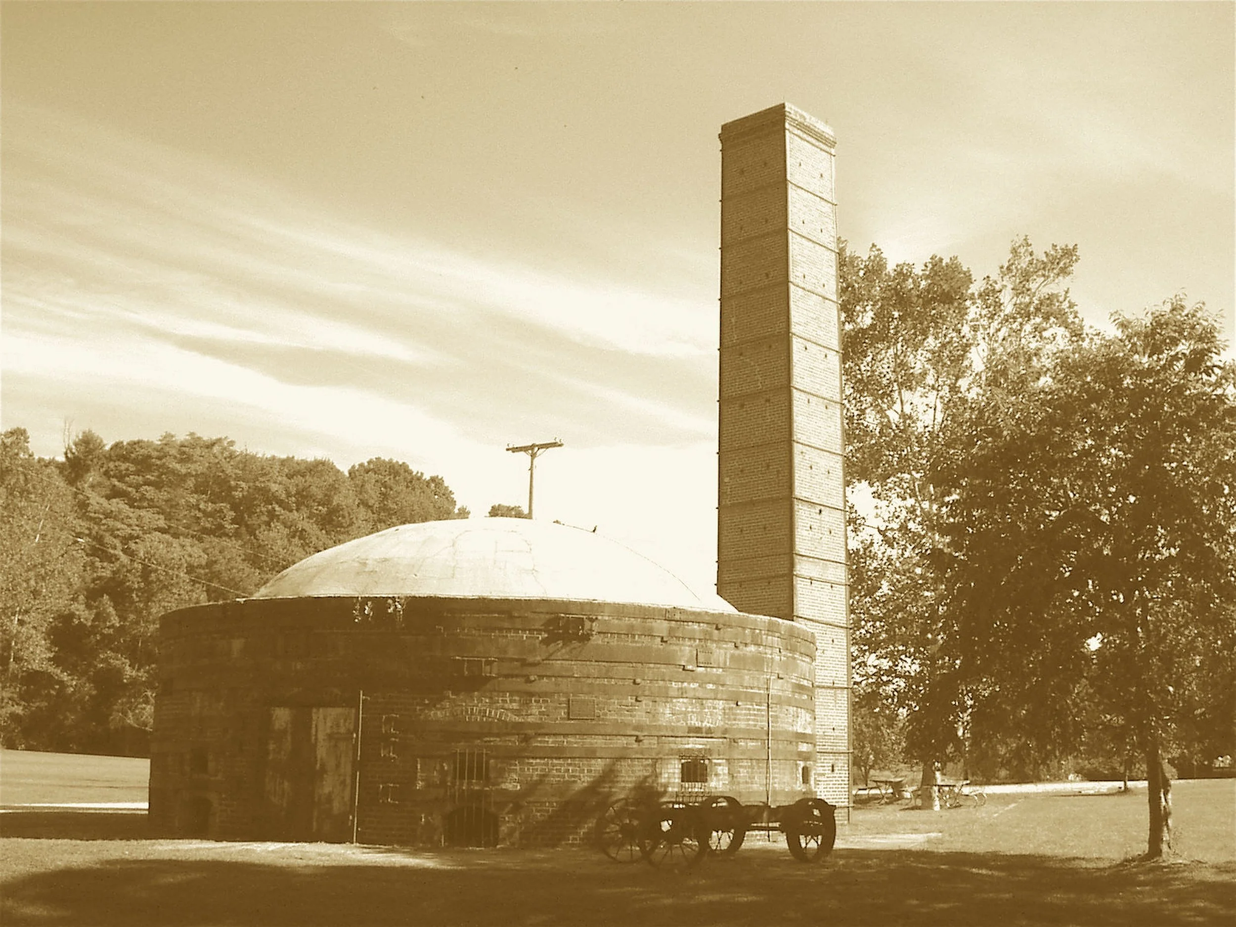 A dome of clay with chimney wide,
Where bricks were baked and time defied.
The prisoners worked by glowing heat,
To line each town with red-clay street.
One kiln remains, its story told,
Of labor, fire, and bricks grown bold.