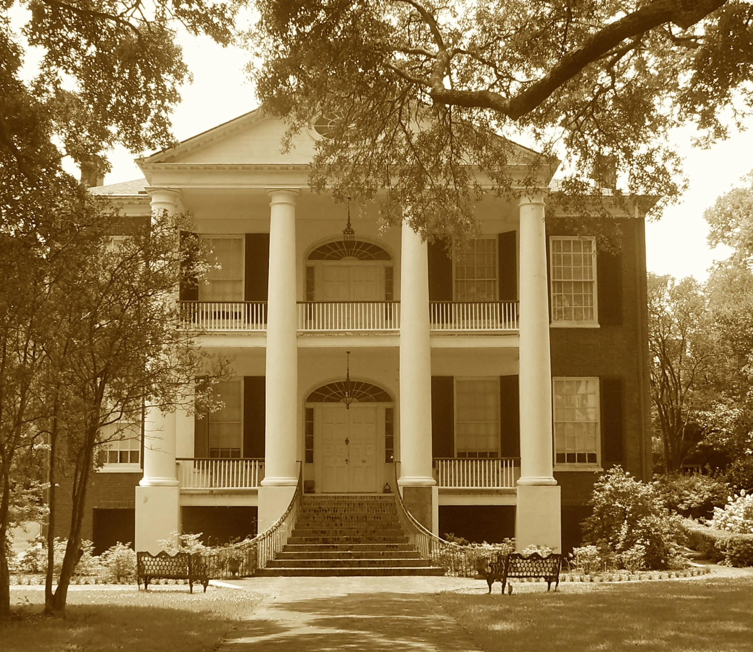 A Southern belle with columns wide,
Watched bluecoats camp and flags collide.
Grant walked its halls, his family near,
While Southern charm masked rebel cheer.
The war passed on but left its trace,
In secrets whispered through this place.