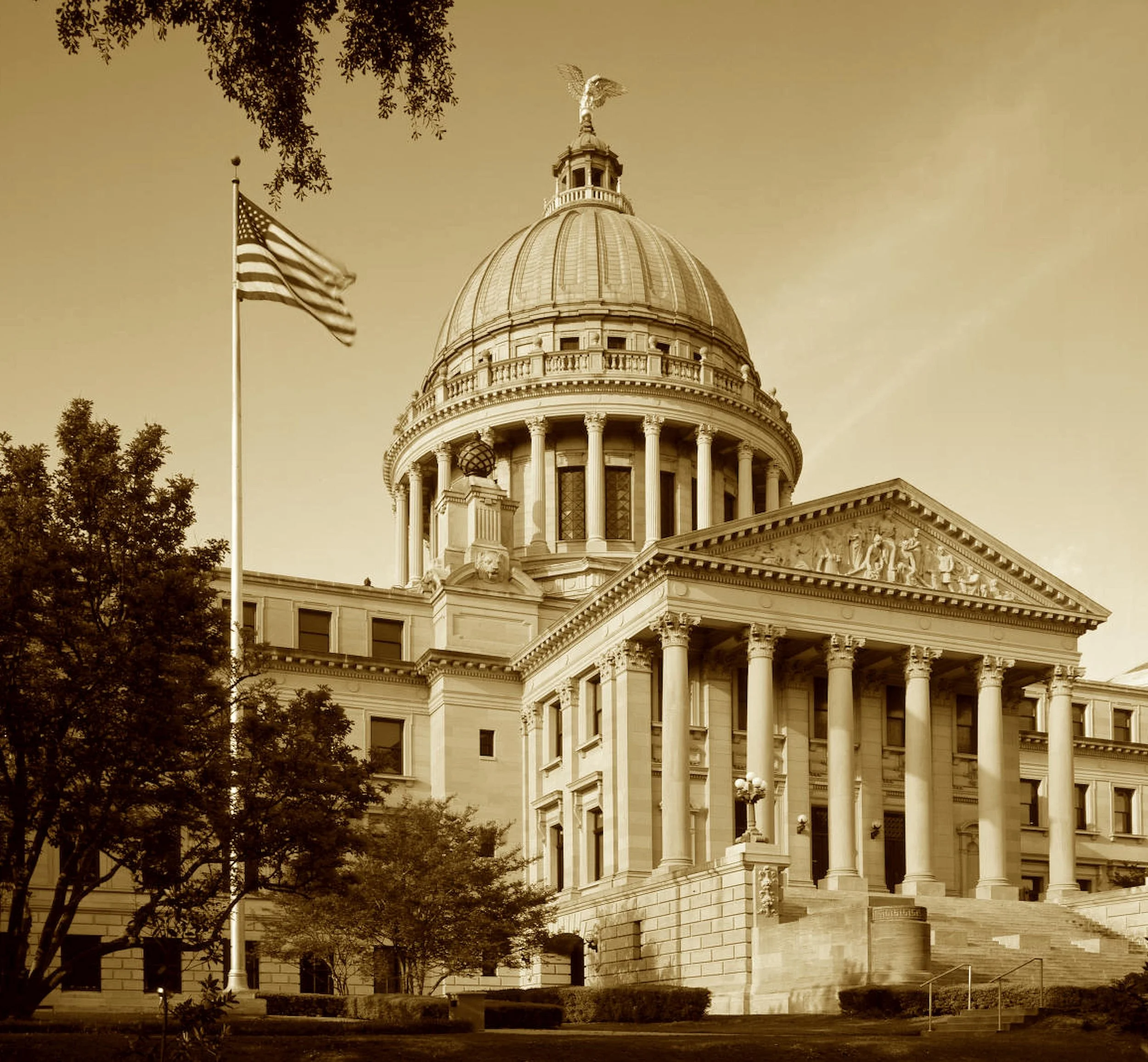A Greek dome rose on southern soil,
To house debate, resolve, and toil.
Secession’s words rang through its dome,
Then Union fire left little home.
Yet still it stands, a stately shell,
That’s seen the rise and ruin well.