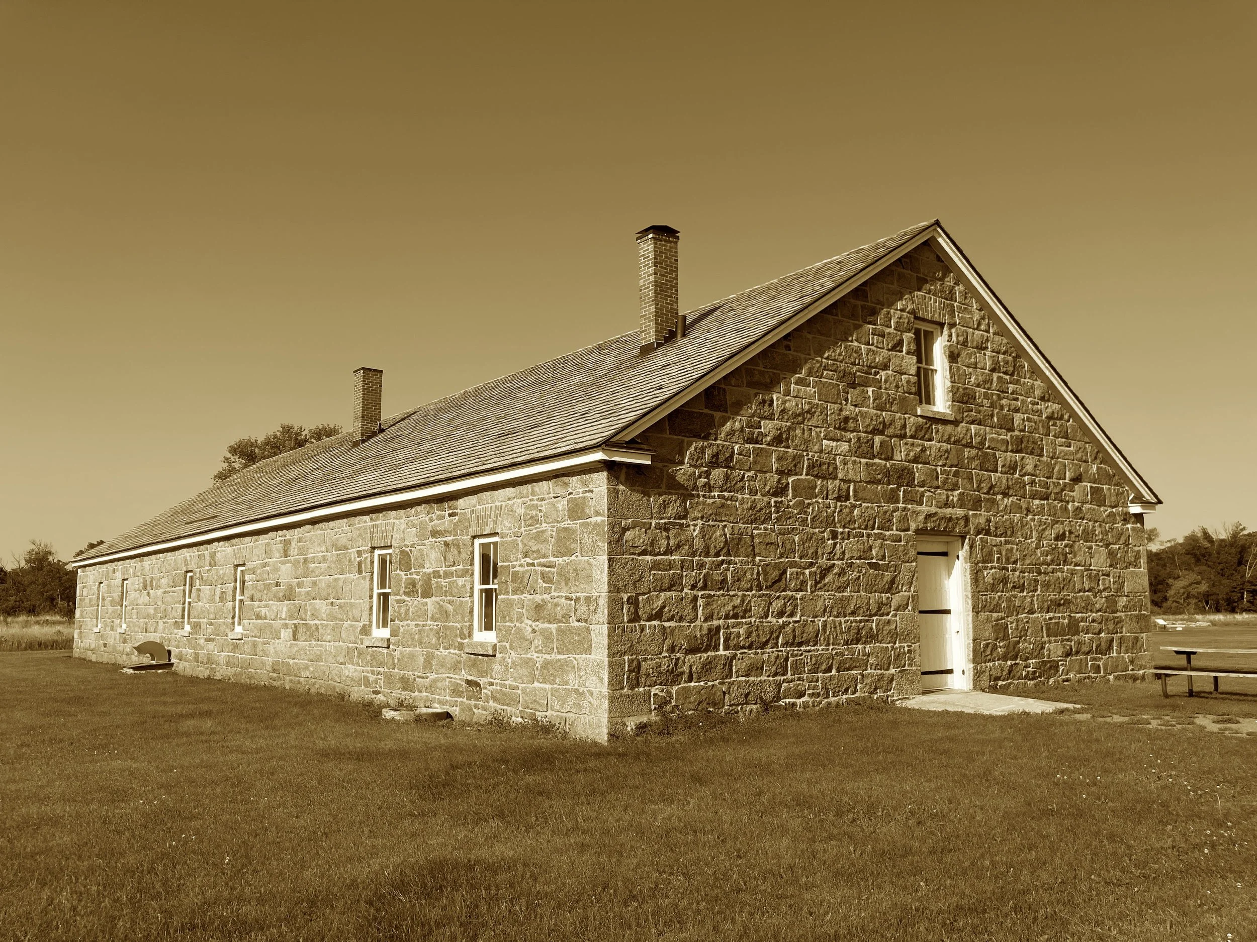 Built to guard a wagon trail west,
With granite walls and no palisade dressed.
Under siege it stood its ground,
When cannon and musket fire did sound.
Now only ruins mark the fray—
Where war expelled a tribe away.