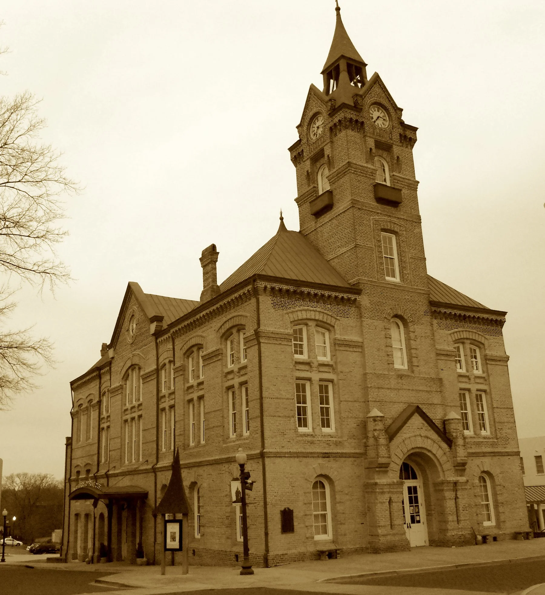 With French-flair roof and local stone,
It brought the grand to every tone.
From minstrels, plays, and mind control,
It gave the Midlands heart and soul.
A town clock chimes above the square,
Where stage and spirit fill the air.