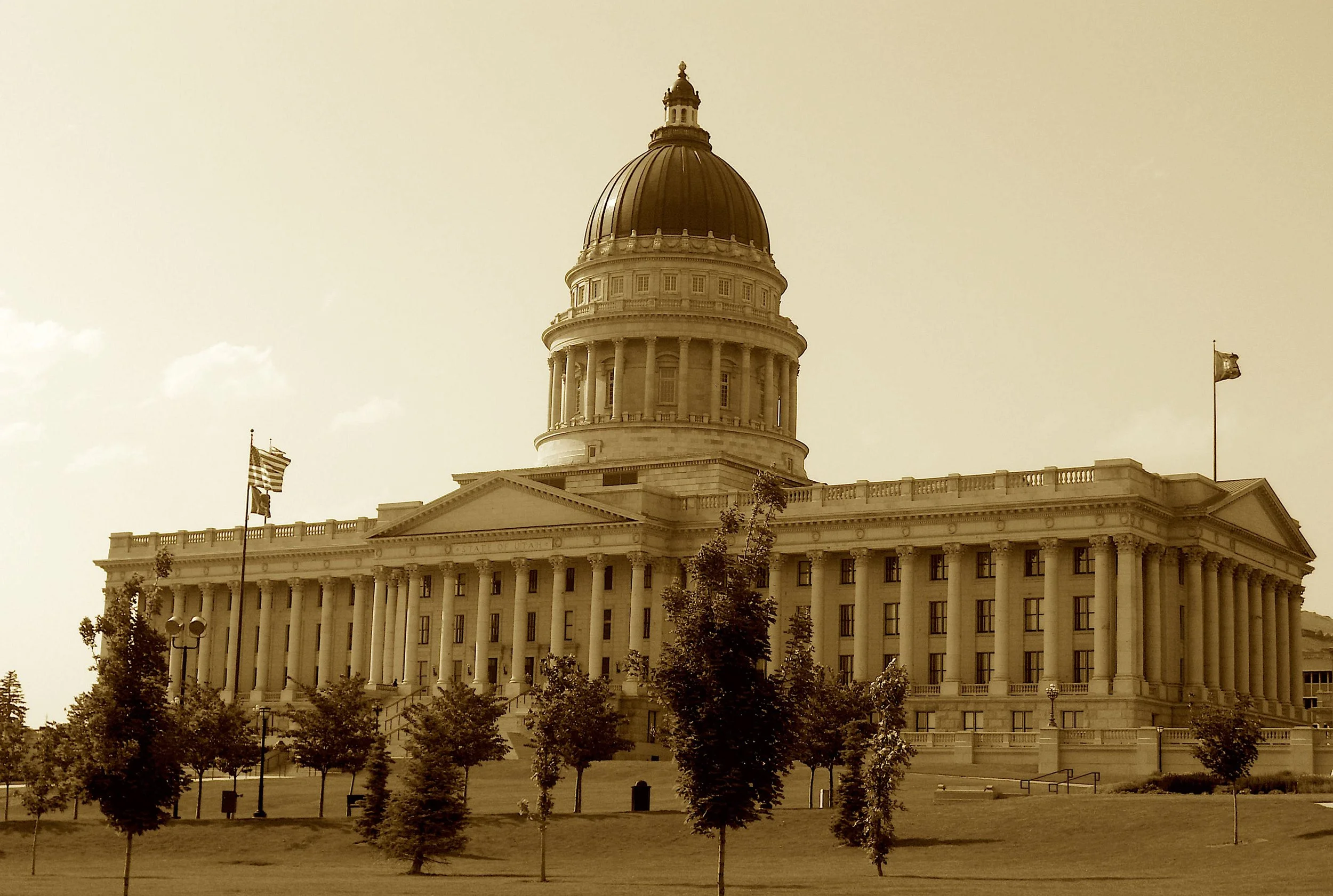 Six decades roamed from hall to hall,
Until they crowned the granite wall
With Kletting’s dome and columns tall.
A copper hat, a stony base—
The Beehive’s grand and stately place,
For votes and laws and civic grace.