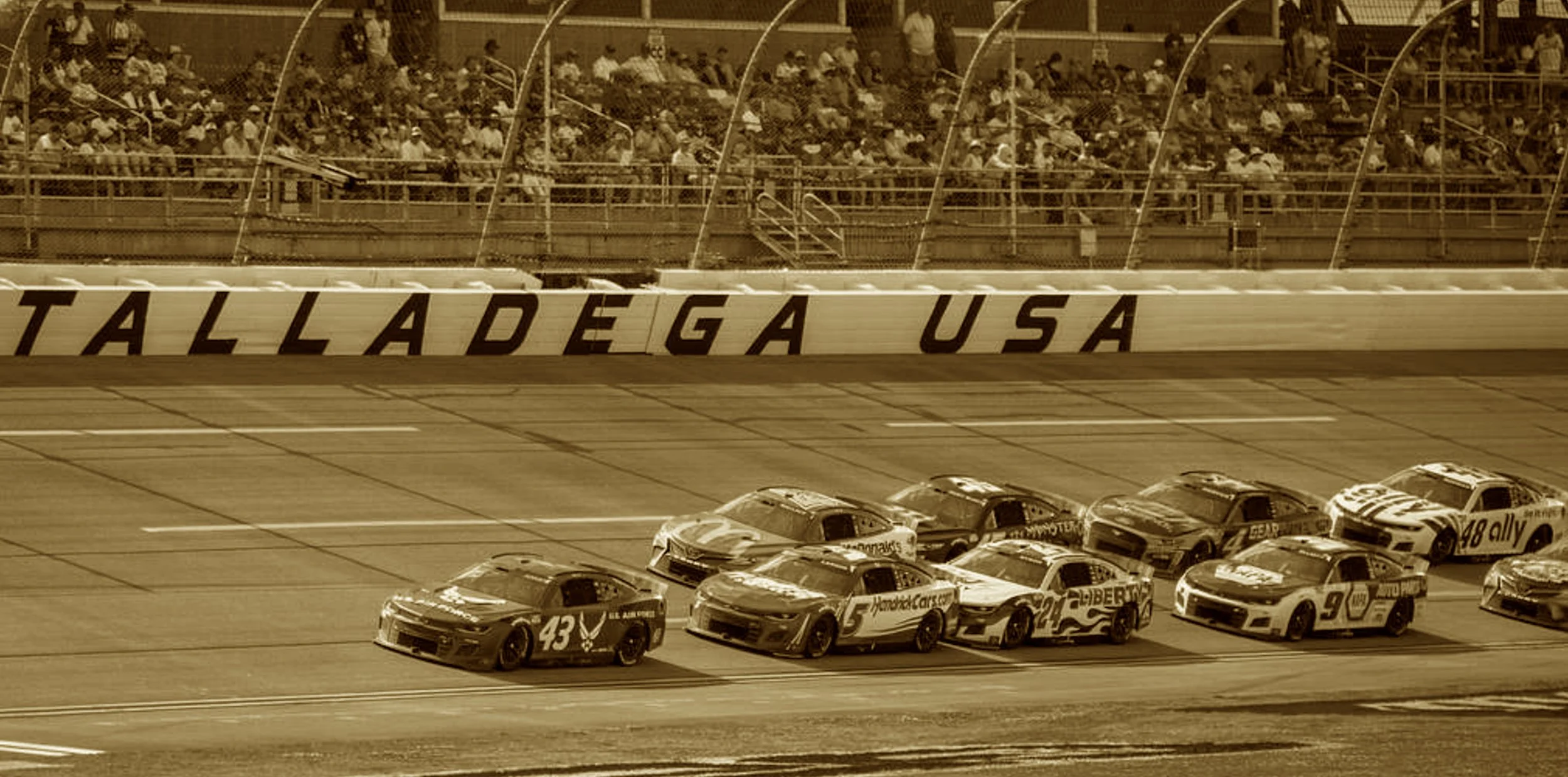France dreamed a track that tore the air—
A roaring loop past sane repair.
At 200, wheels could fly—
And Bobby Allison touched the sky.
Now plates restrict the roaring chase—
But Dega still sets hearts to race.