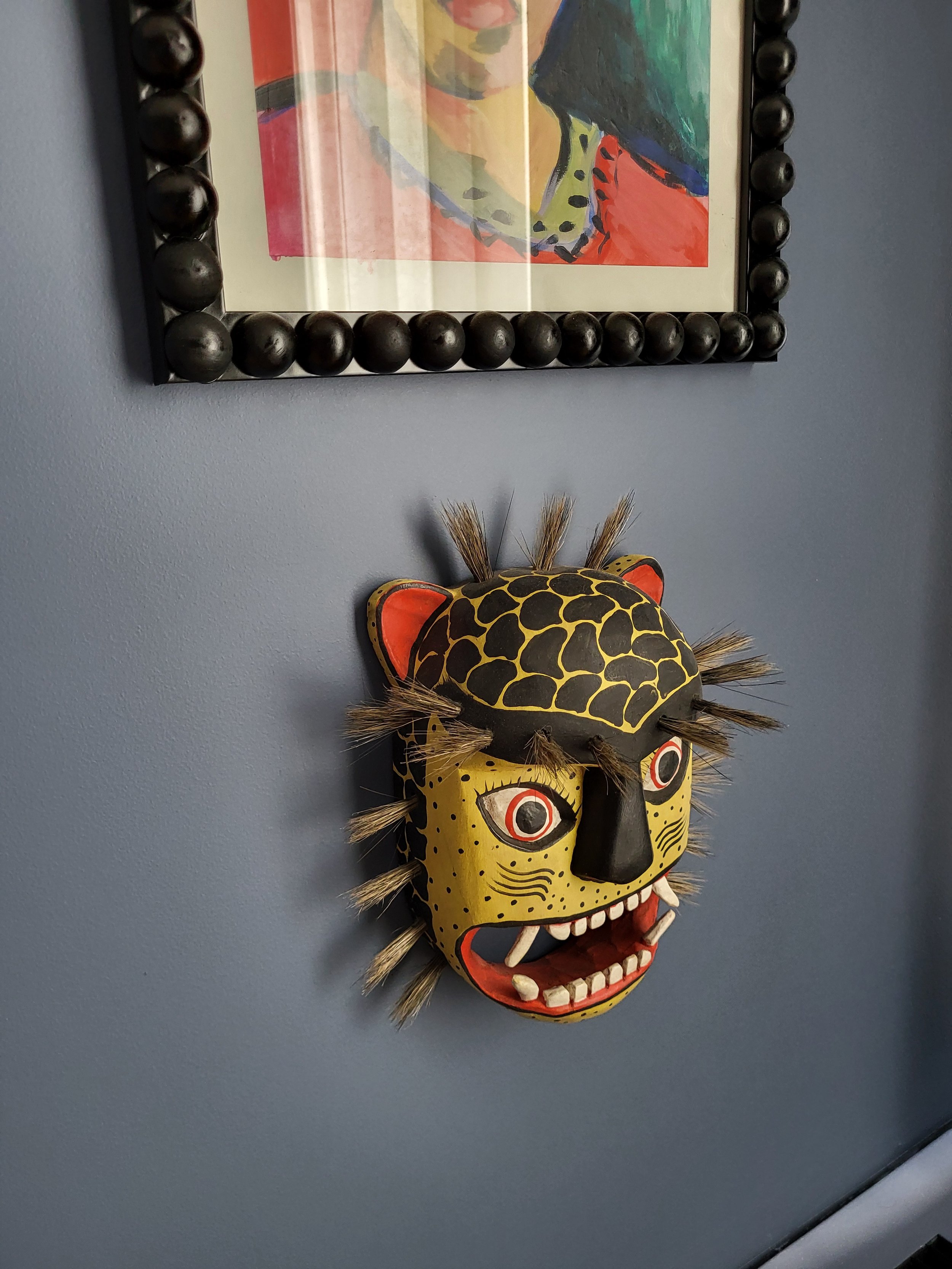 Handmade art from my time at Moore and a vintage Guatemalan festival mask from Eyes Gallery.