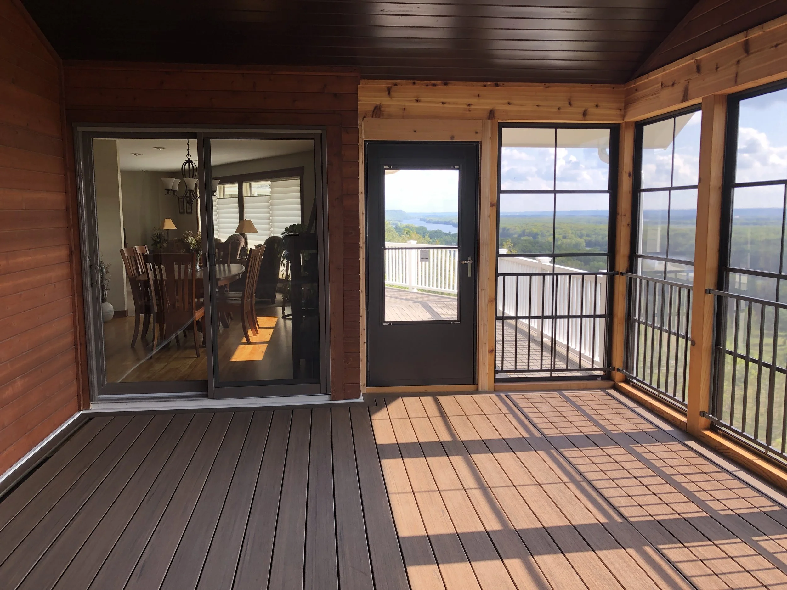 Oranssi technician working on a roof project