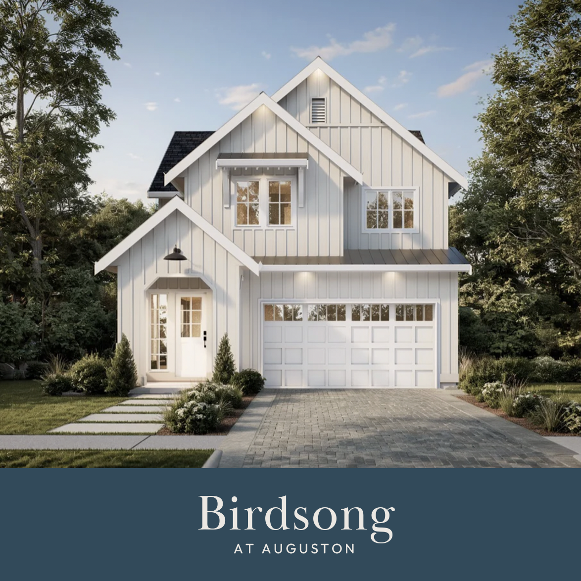 Modern two-story house with a white exterior, black roof, and attached garage, surrounded by trees and landscaped yard.