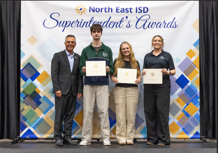 Students receiving NEISD Superintendent's award
