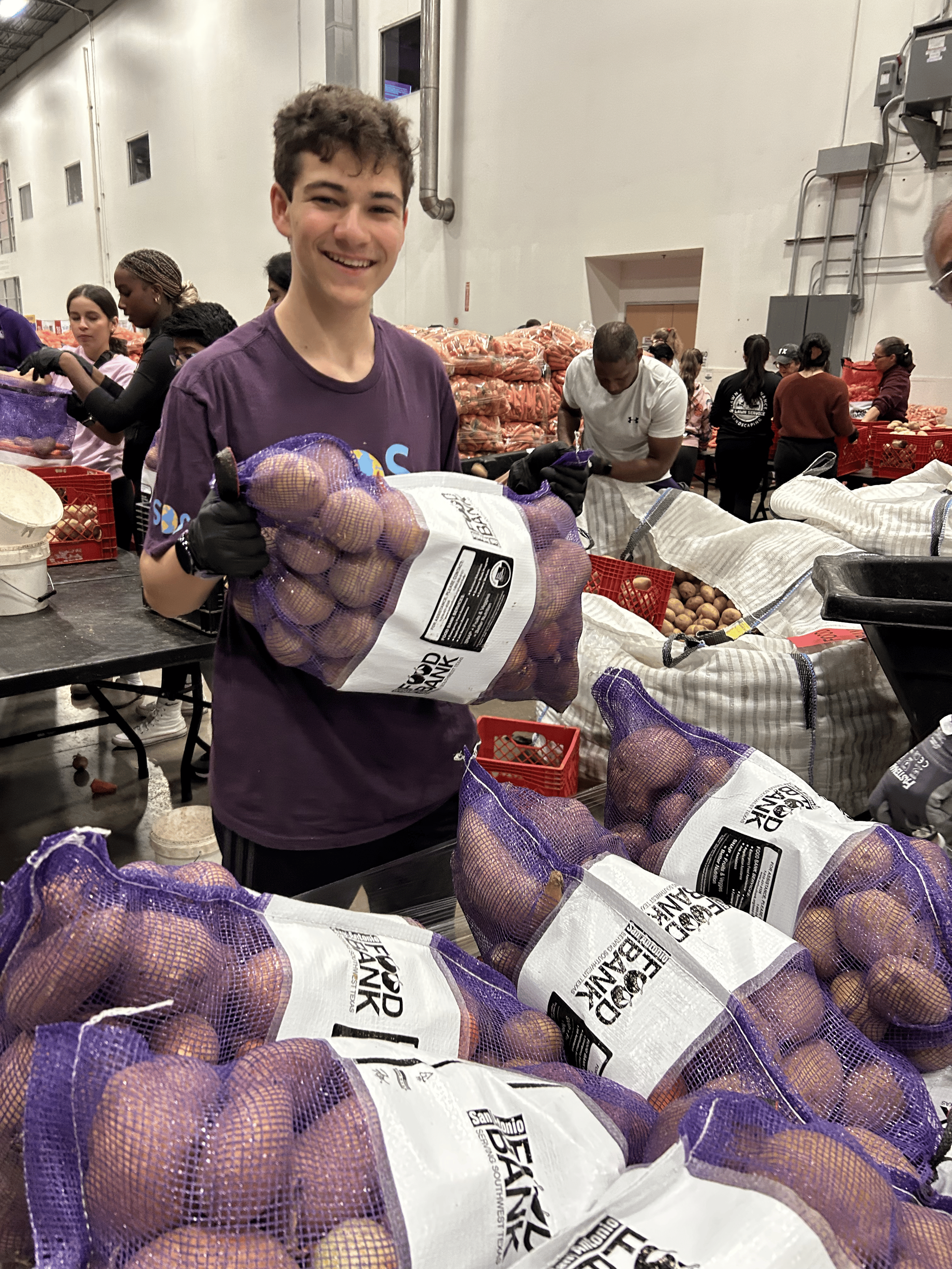 Student doing service at the food bank