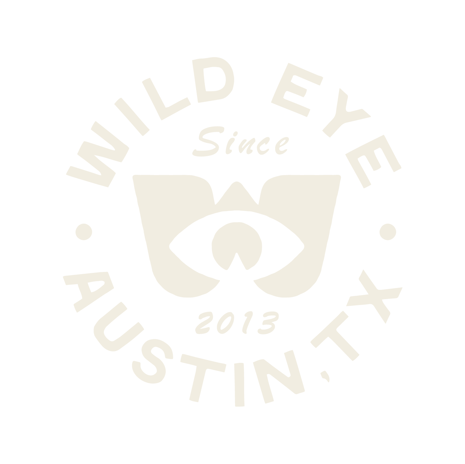 A faded logo with the words "Wild Eye Austin" and "Since 2013" surrounding a stylized eye with an open book and an eye in the center.