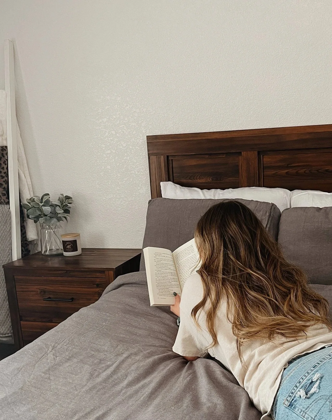 Woman journaling at home in Chicago, preparing for pregnancy