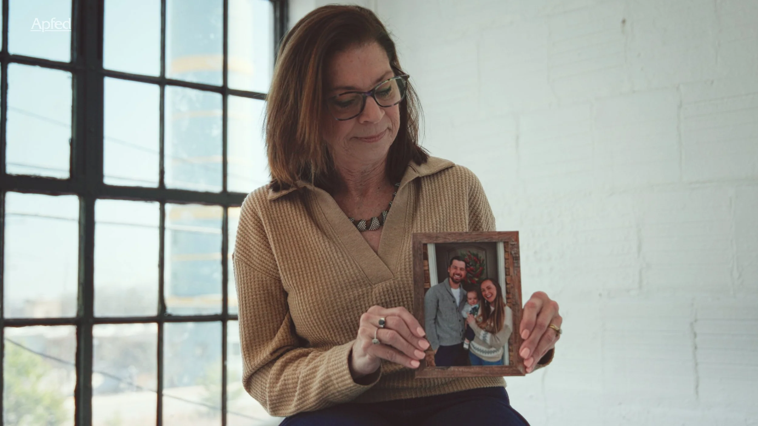 Emotional storytelling scene filmed for nonprofit video production in Atlanta, highlighting personal stories through strategic video content.