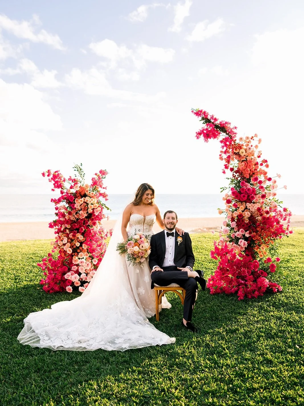 Golden hour, ocean views, and florals in full bloom. 🌺✨&thinsp;
Our stunning Blush bride soaking in the sweetest just-married moment with her love. Surrounded by the most vibrant ceremony florals and the dreamiest seaside backdrop. Pure magic from e