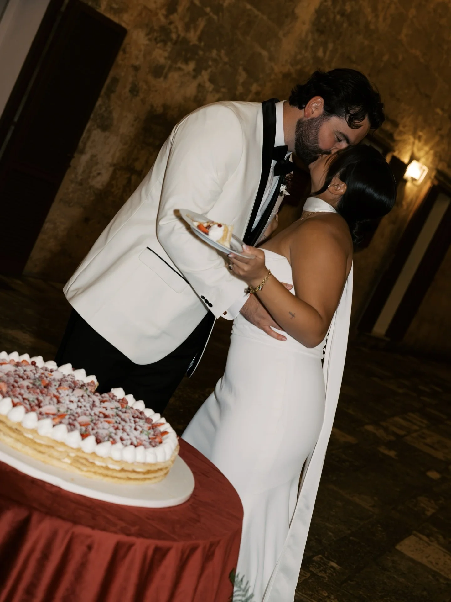 Sealed with a kiss&hellip; and a slice of cake. 🤍🍓 A little sweetness to end the perfect night.&thinsp;
&thinsp;
#blushbridalcouture #sayyestothedress #blushbride #realbride #robertbullock