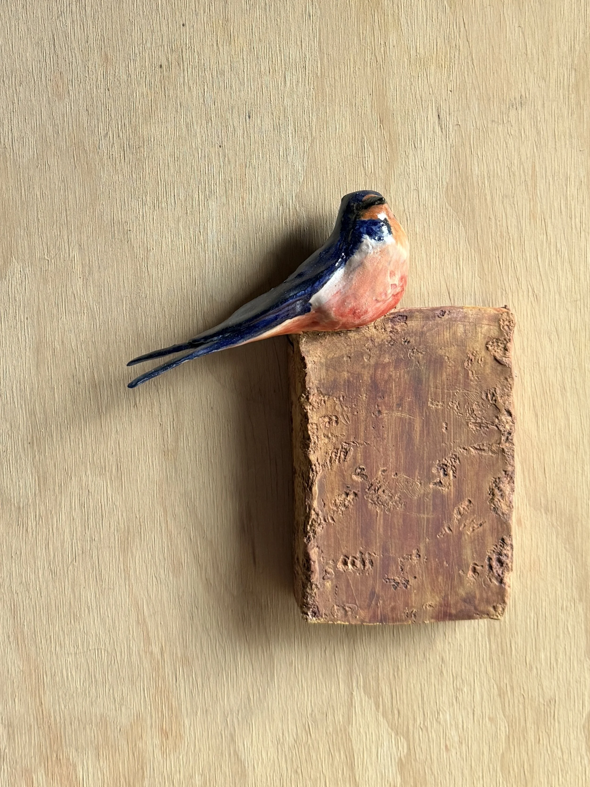 Barn Swallow on wall plaque