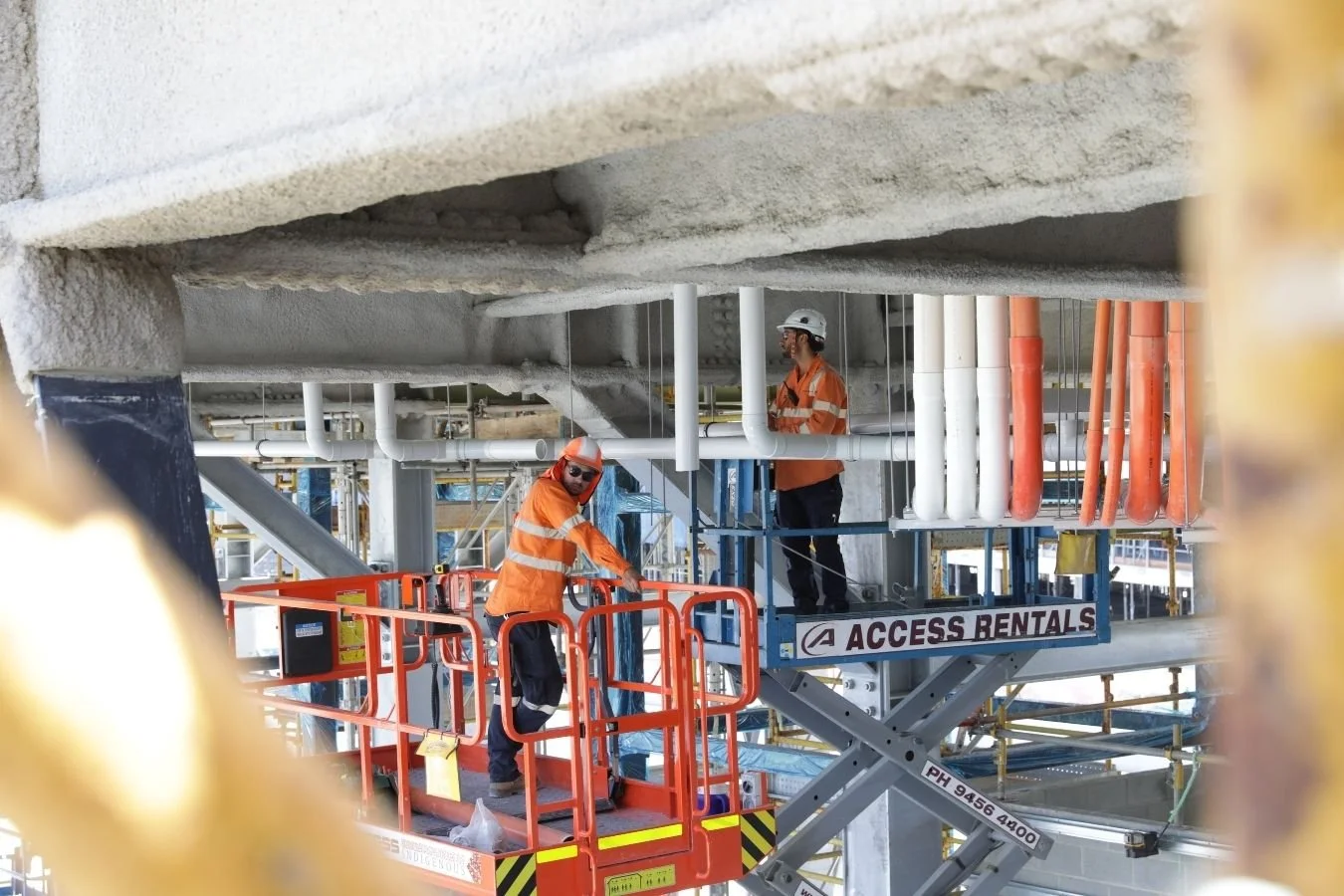 TRSWA commercial roofing specialists inspecting government roofing project by TRSWA
